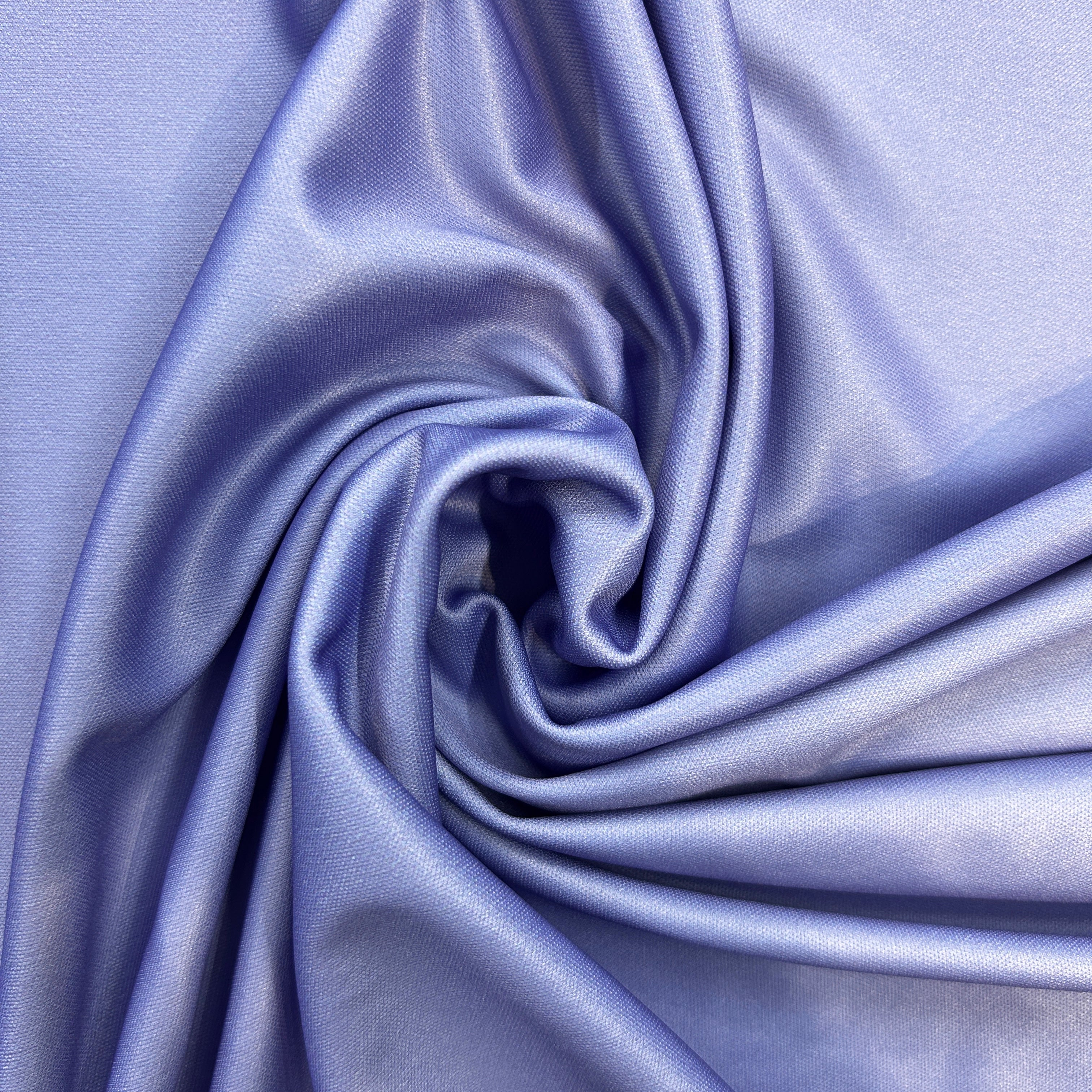 Close-up of blue fabric with folds