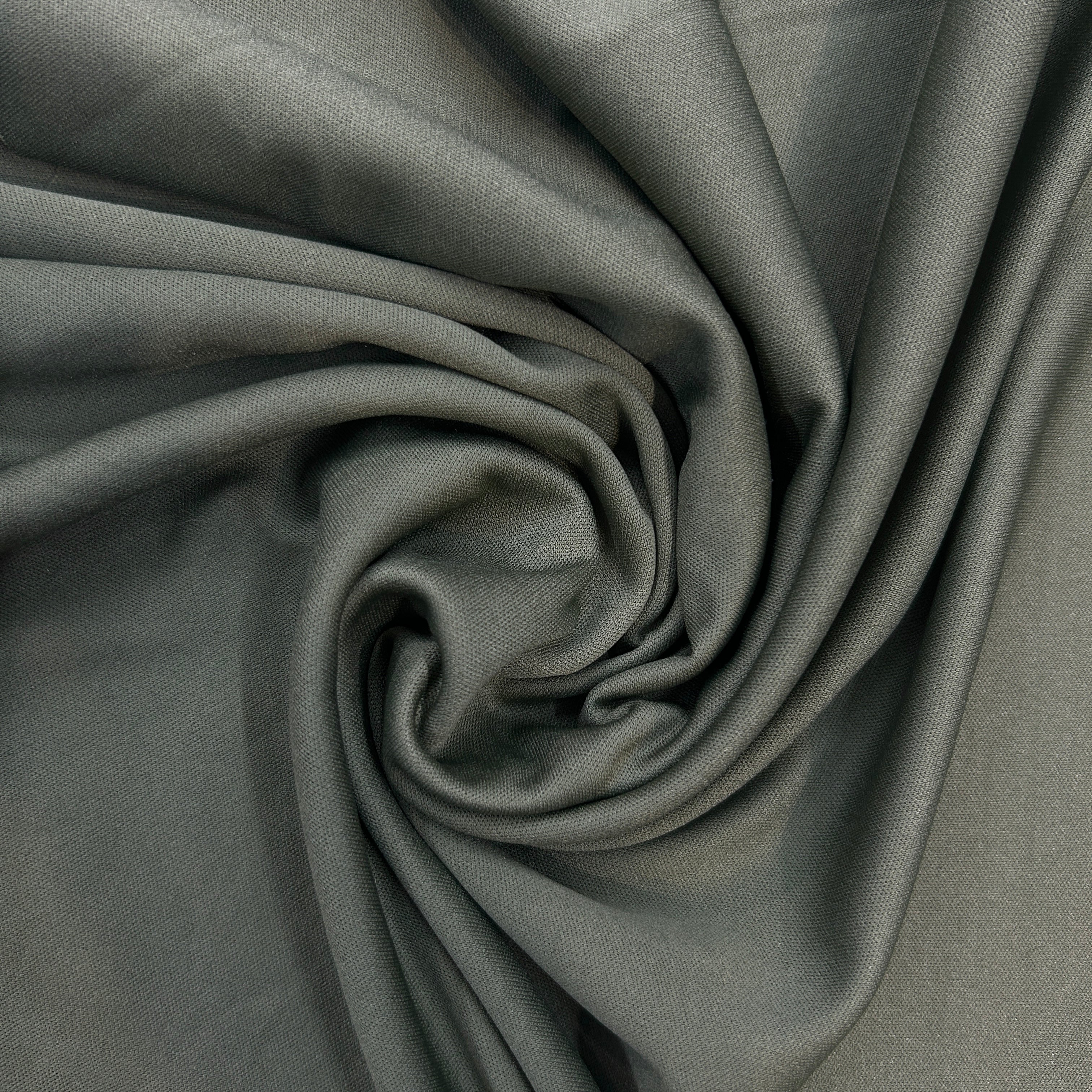 Close-up of gray fabric with folds
