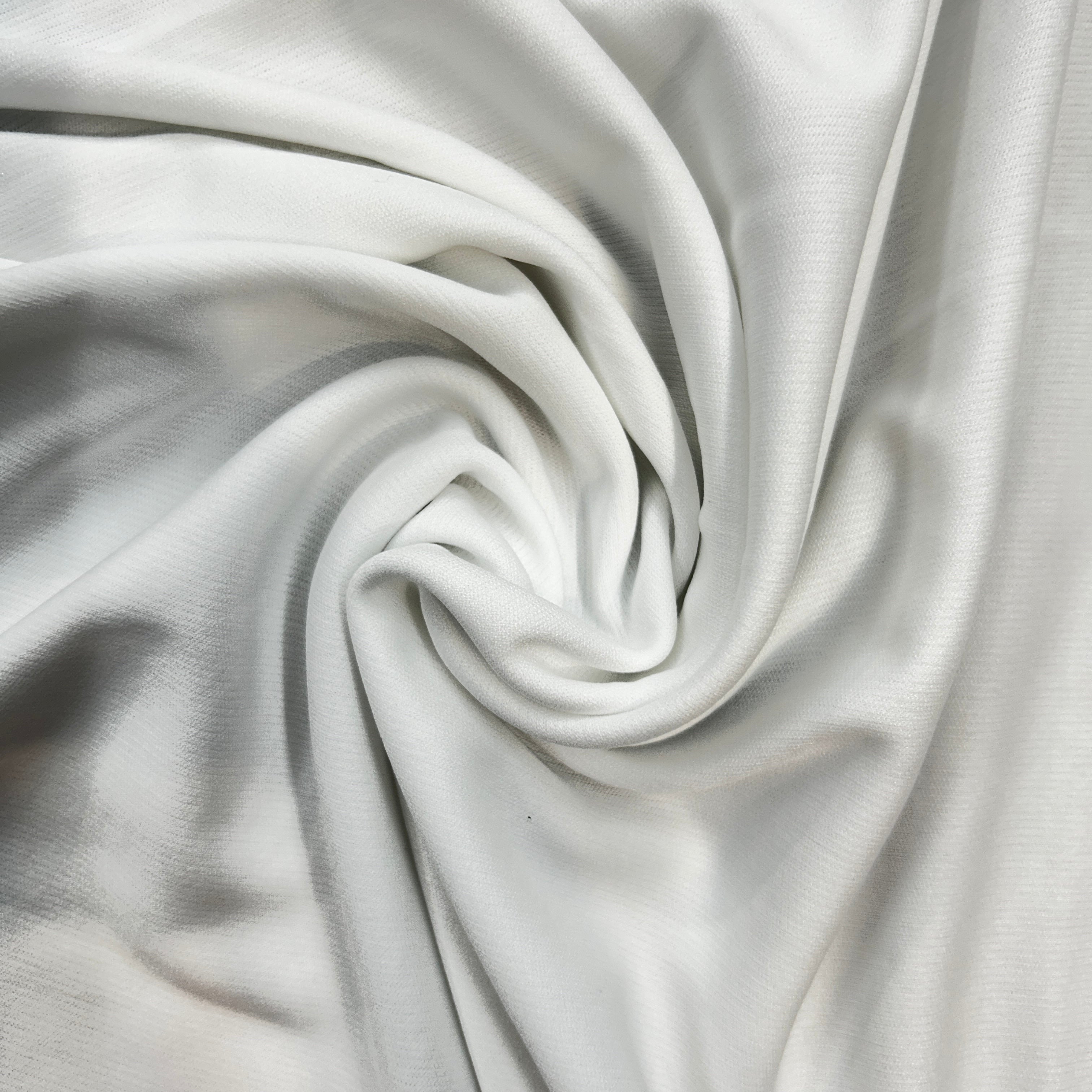 Close-up of white fabric with a subtle texture