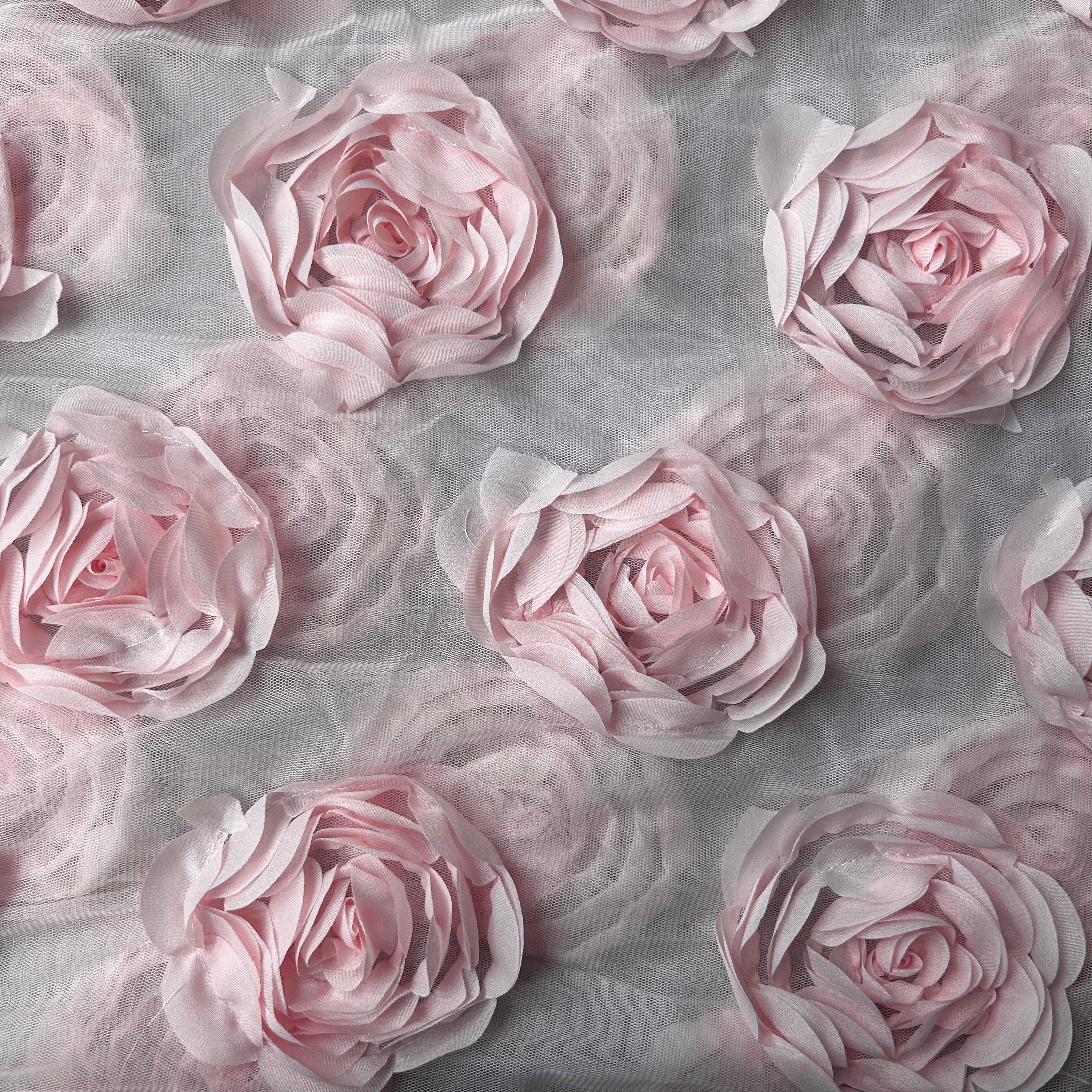 Pattern of pink roses on a light fabric background