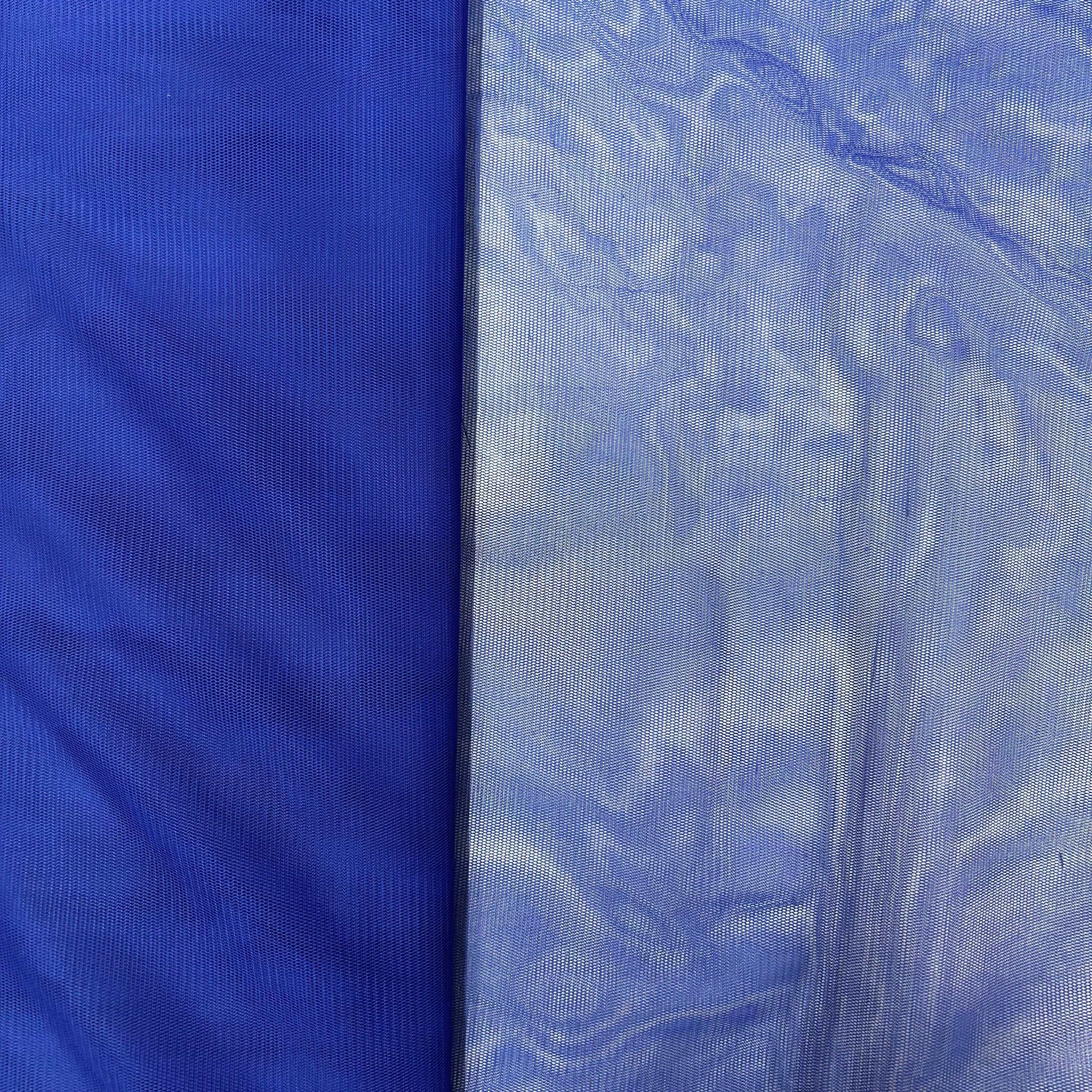 Two different textures of blue fabric side by side