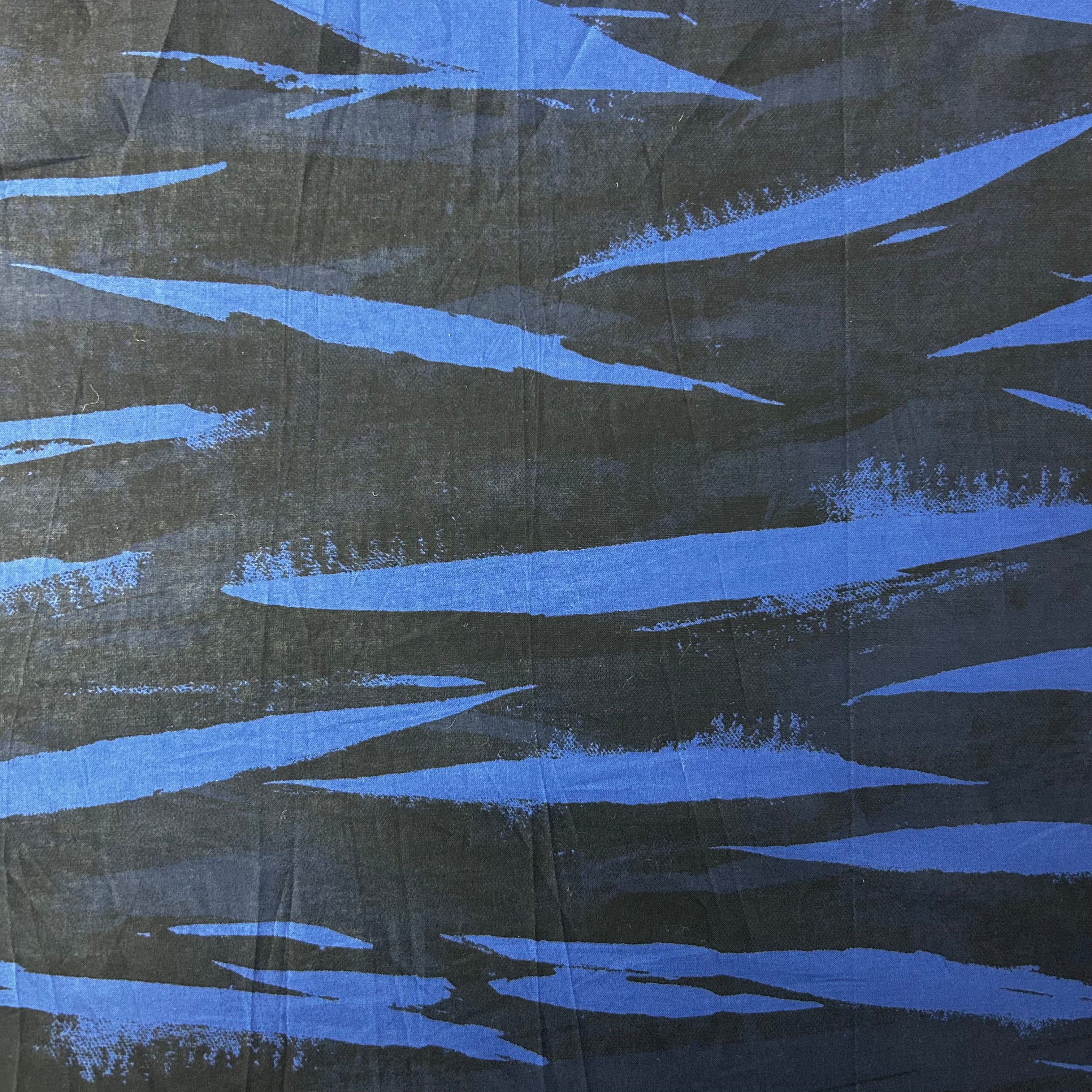 Textile with blue and black abstract pattern