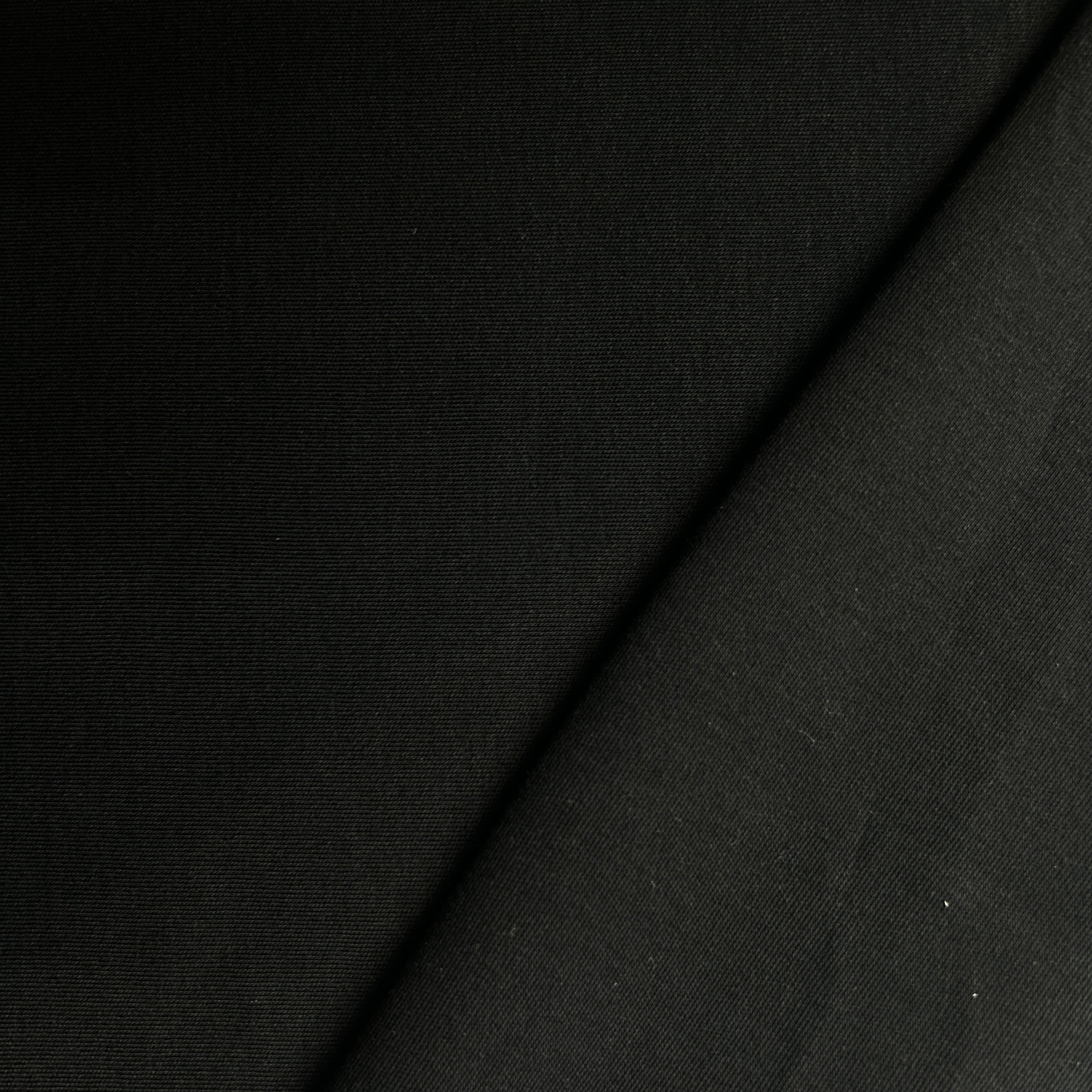 Black fabric texture with a diagonal line