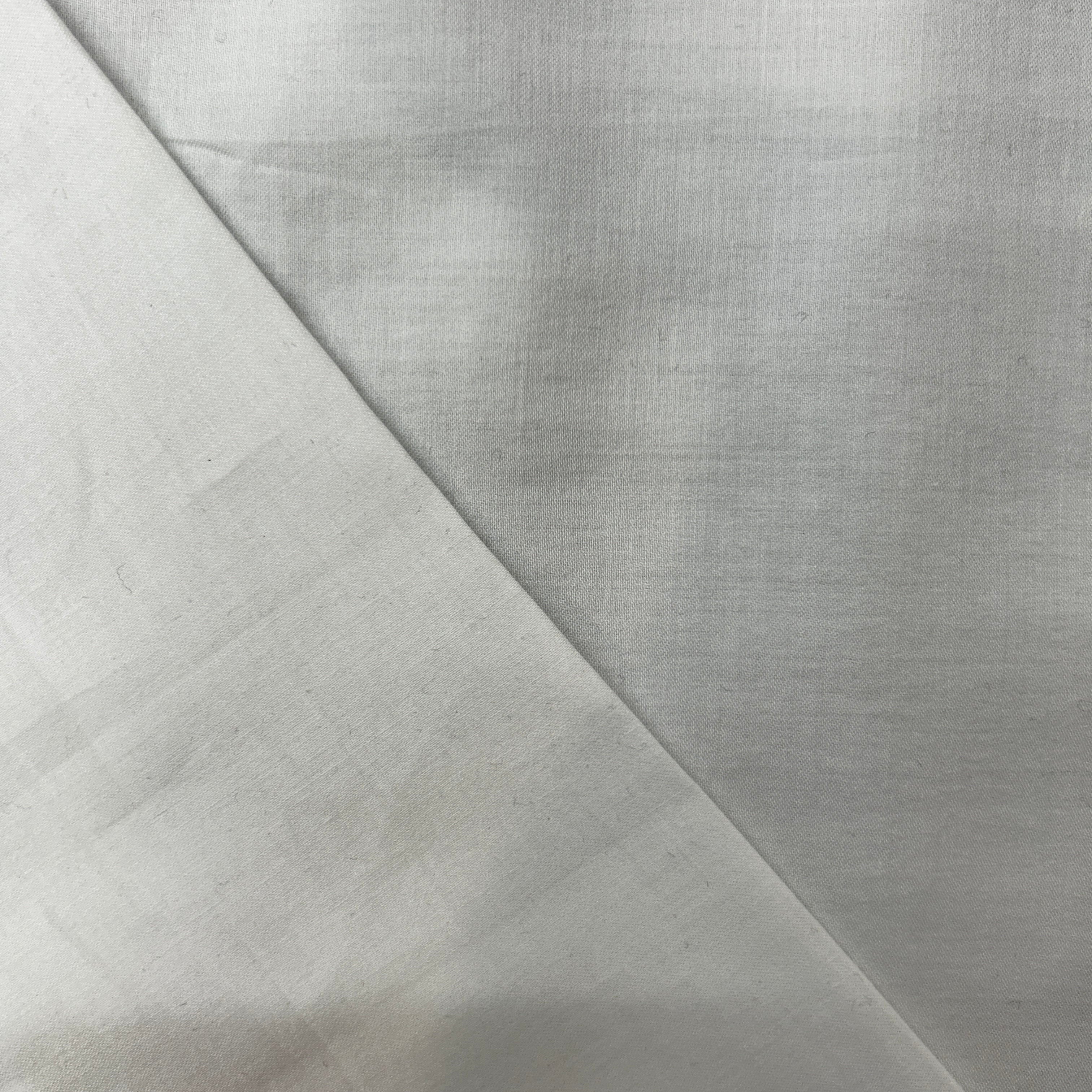 White fabric with a subtle texture pattern