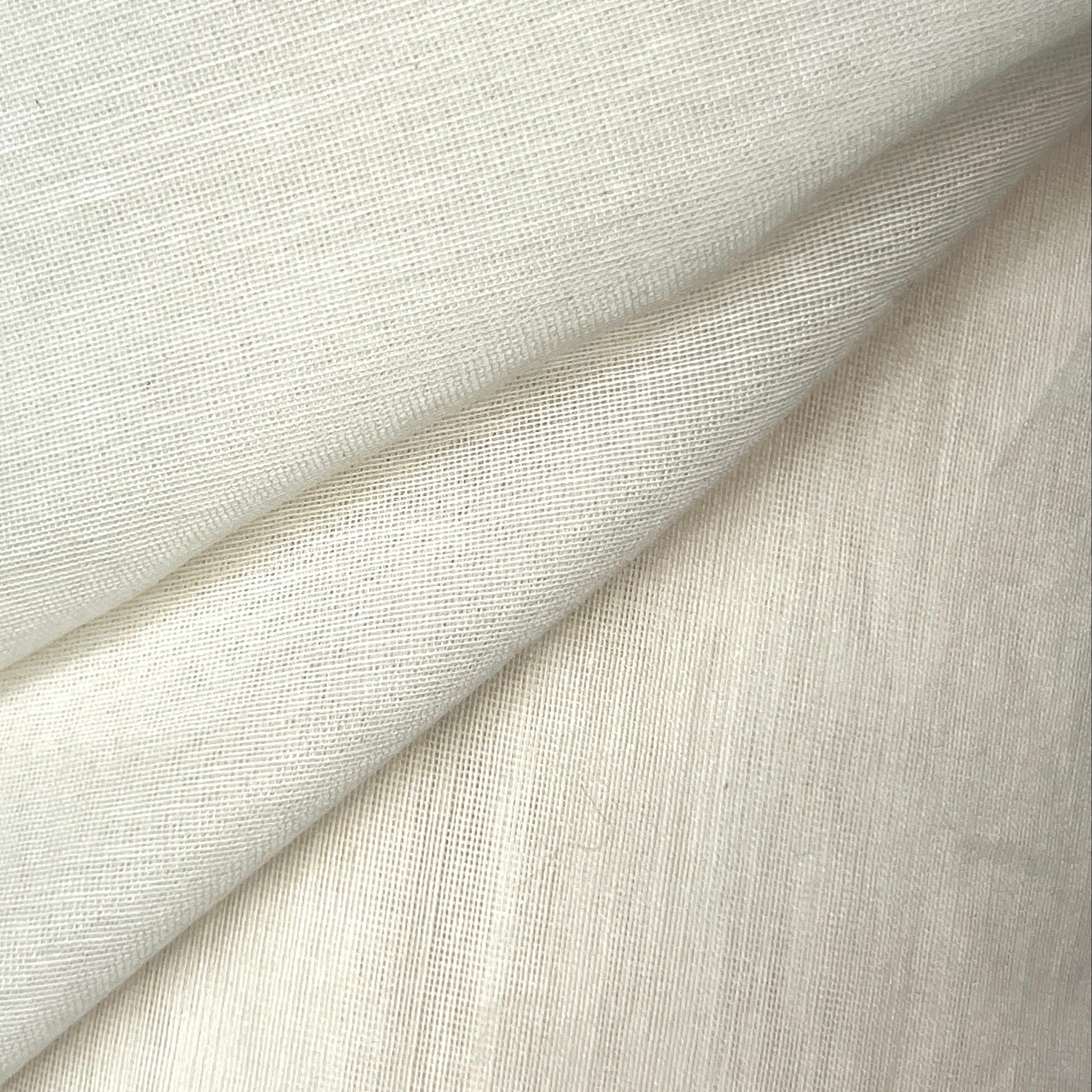 Close-up of textured beige fabric