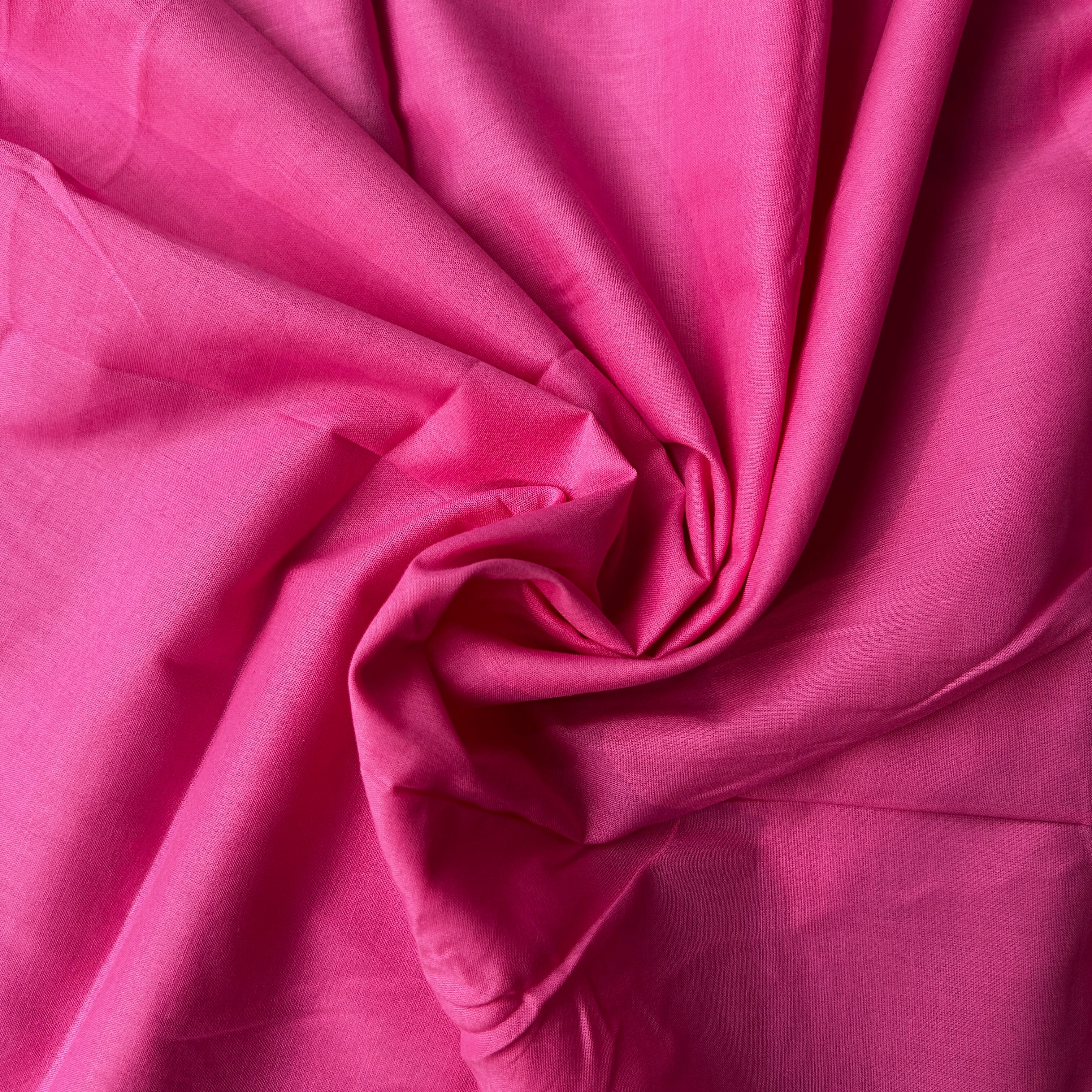 Close-up of pink fabric with folds