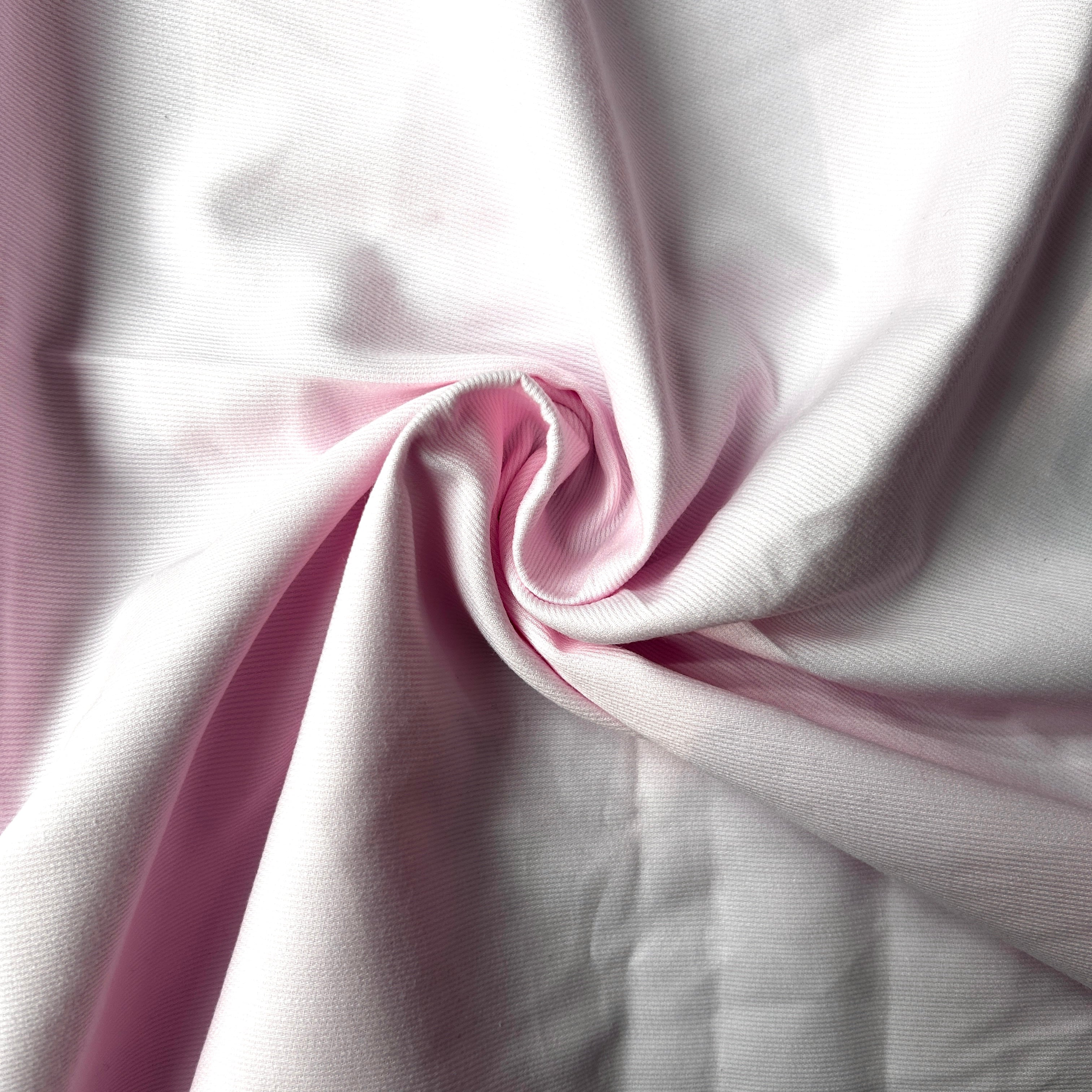 Close-up of pink fabric with a swirl pattern