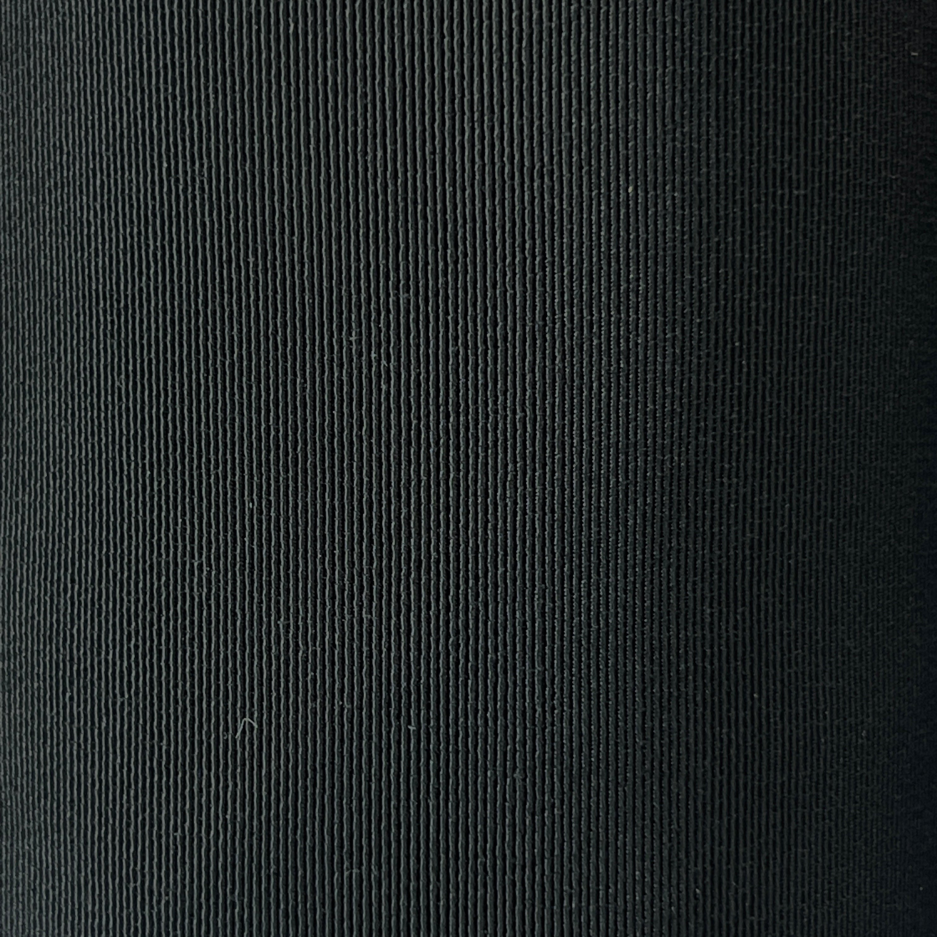 Textured black surface with subtle pattern