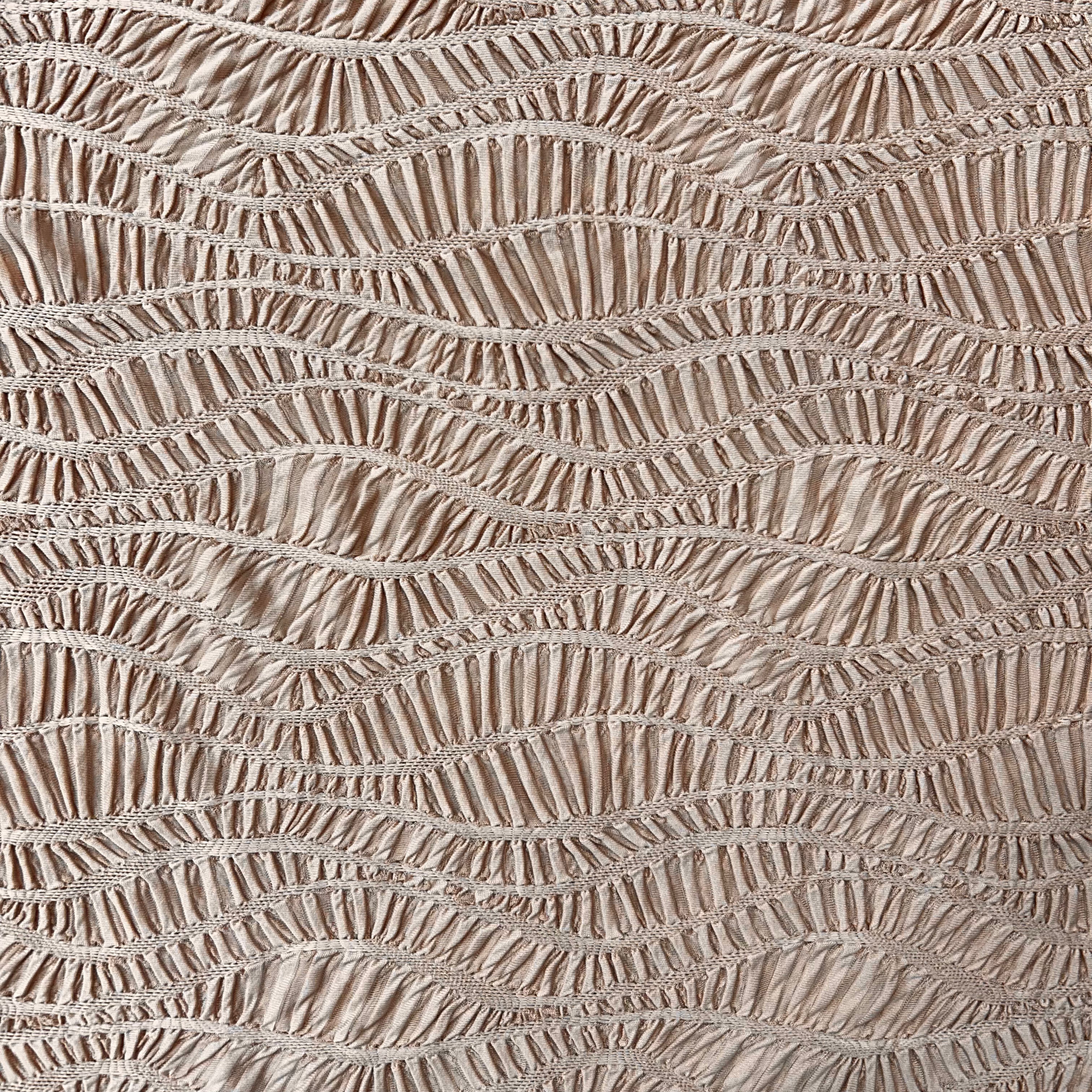 Textured beige fabric pattern