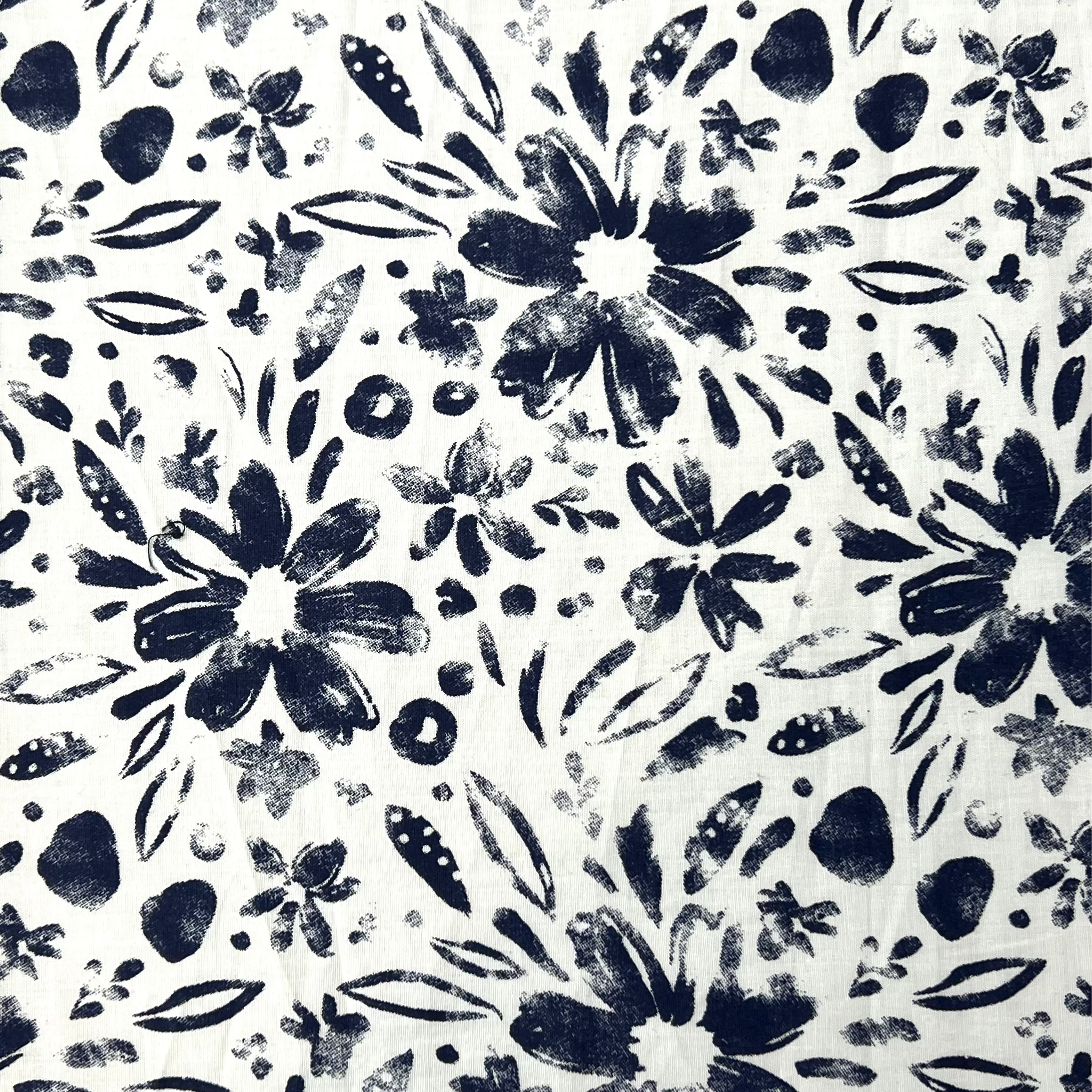 Black floral pattern on a white background