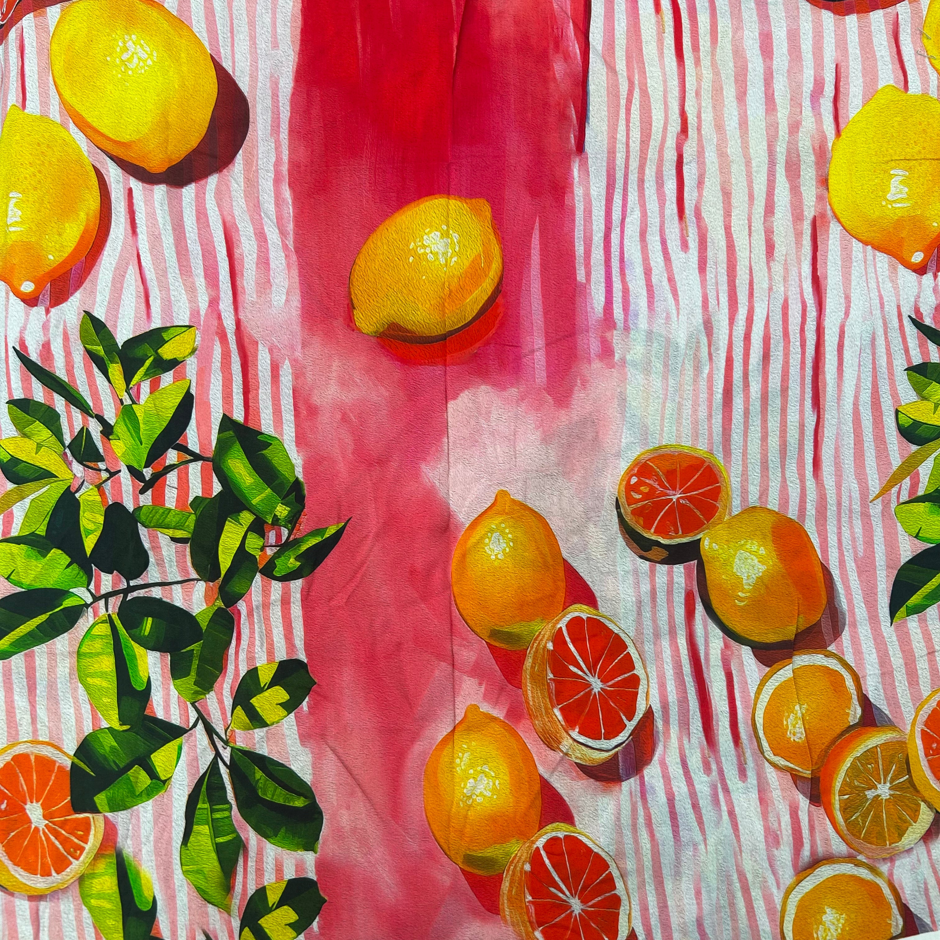 Fabric with a colorful pattern of lemons, oranges, and green leaves on a red and white striped background.