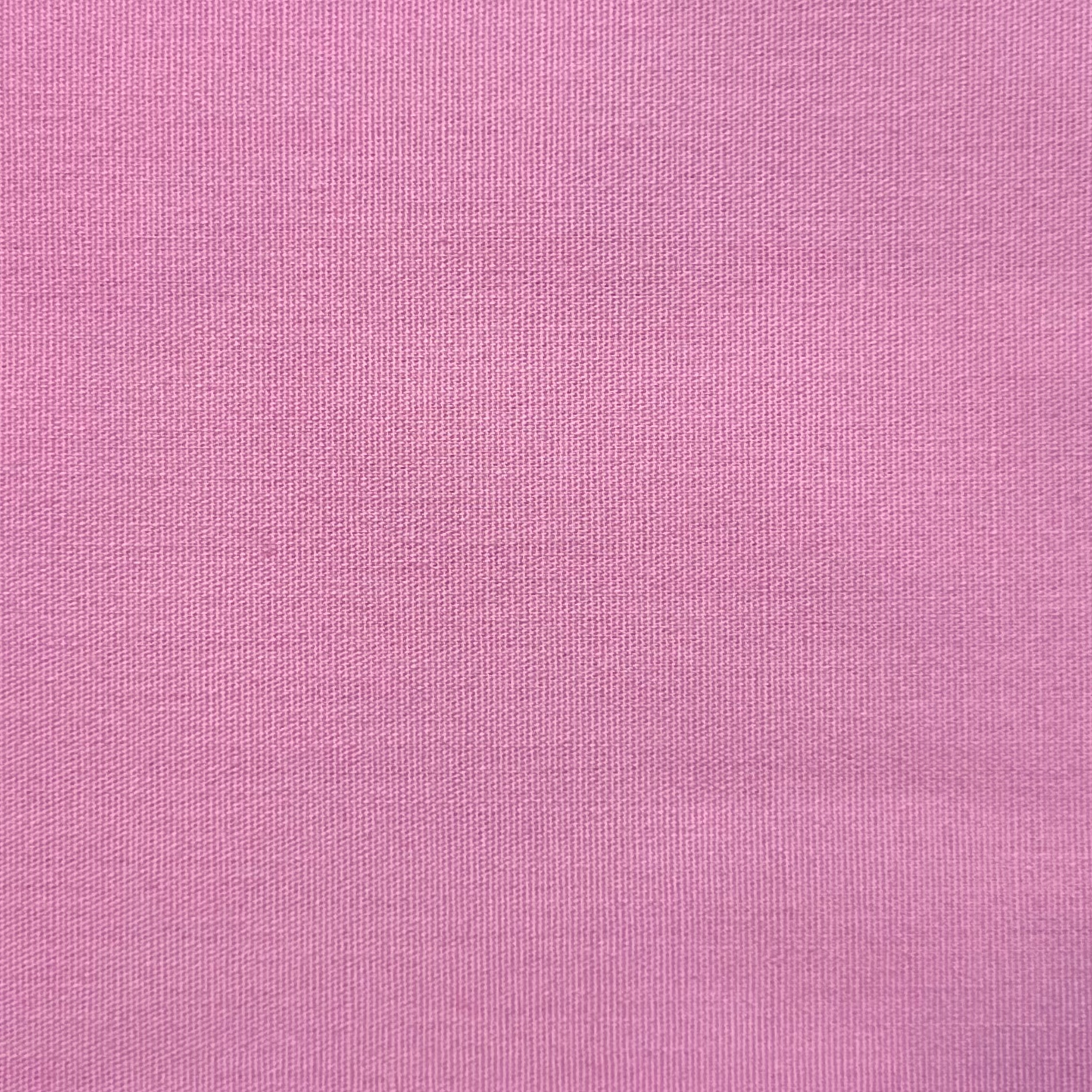 A pink cotton poplin fabric with a visible weave texture.