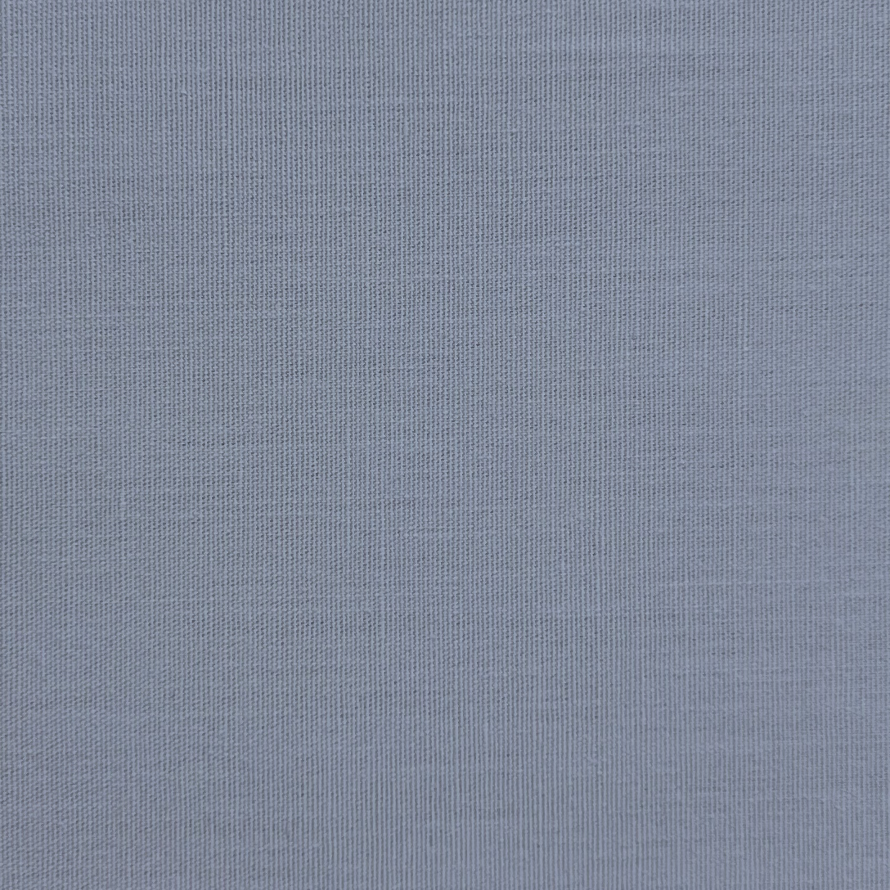 Cotton poplin fabric in a solid color with a smooth, crisp texture.