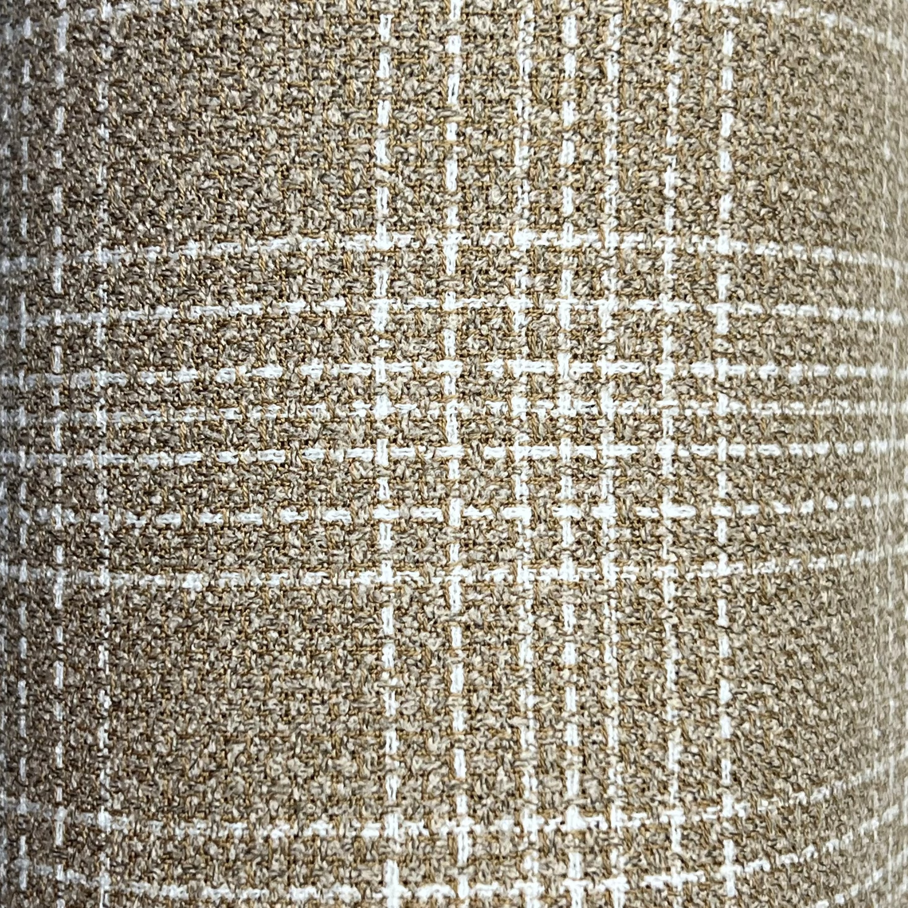Close-up of beige virgin wool and silk tweed fabric featuring a textured white windowpane pattern.
