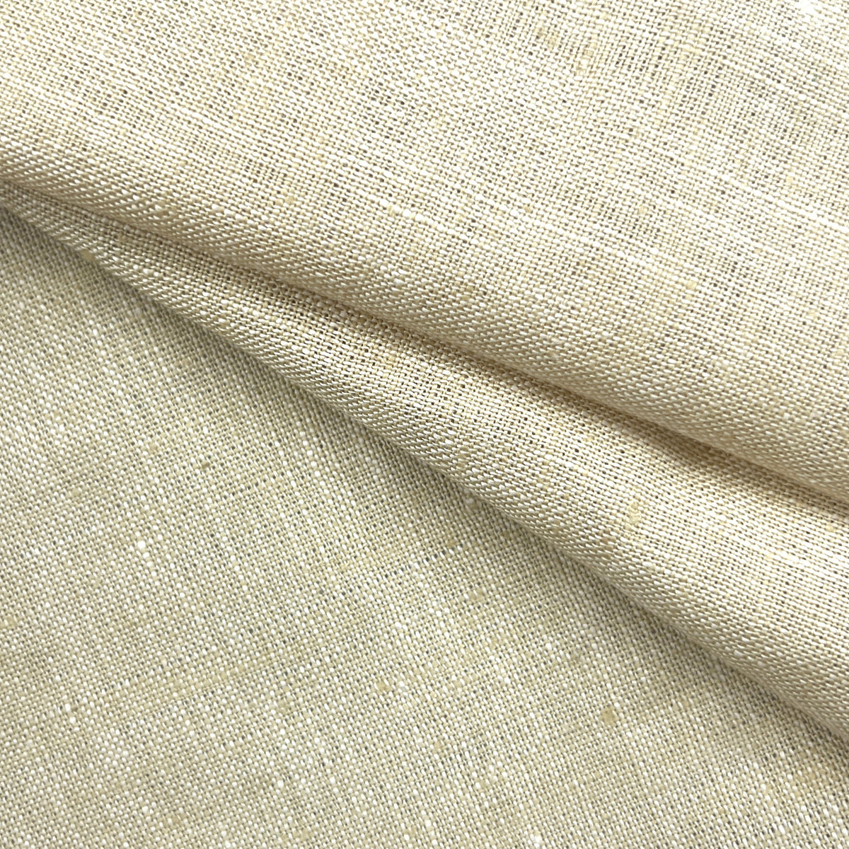 A close-up of draped beige linen fabric with a visible woven texture and soft folds.