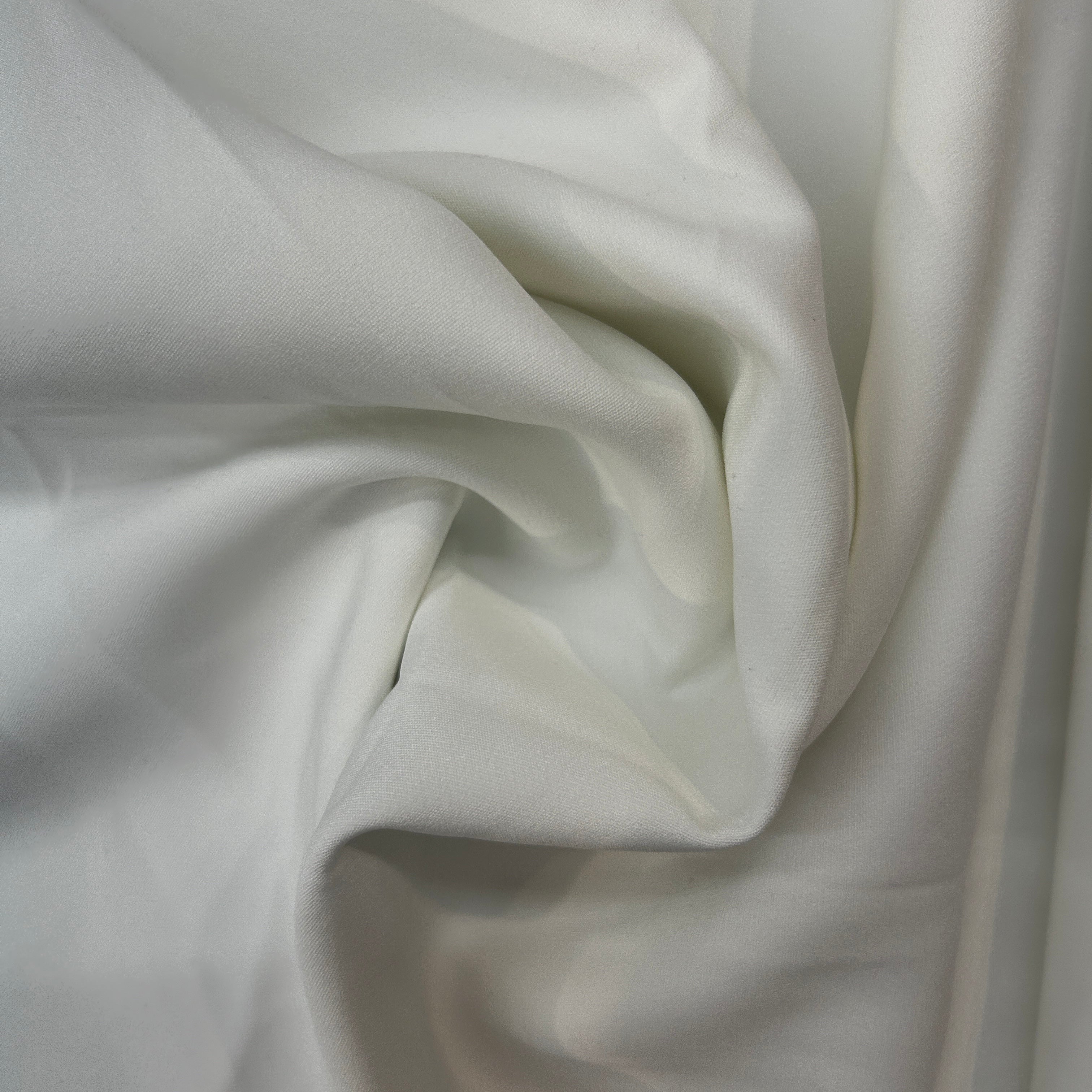 Close-up of white fabric with folds