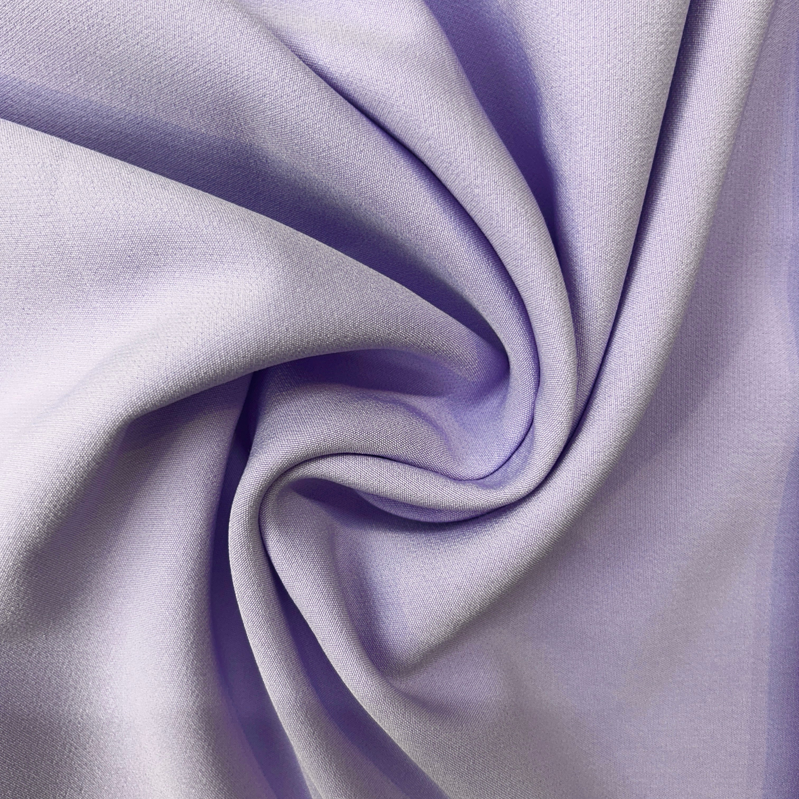 Close-up of purple fabric with folds