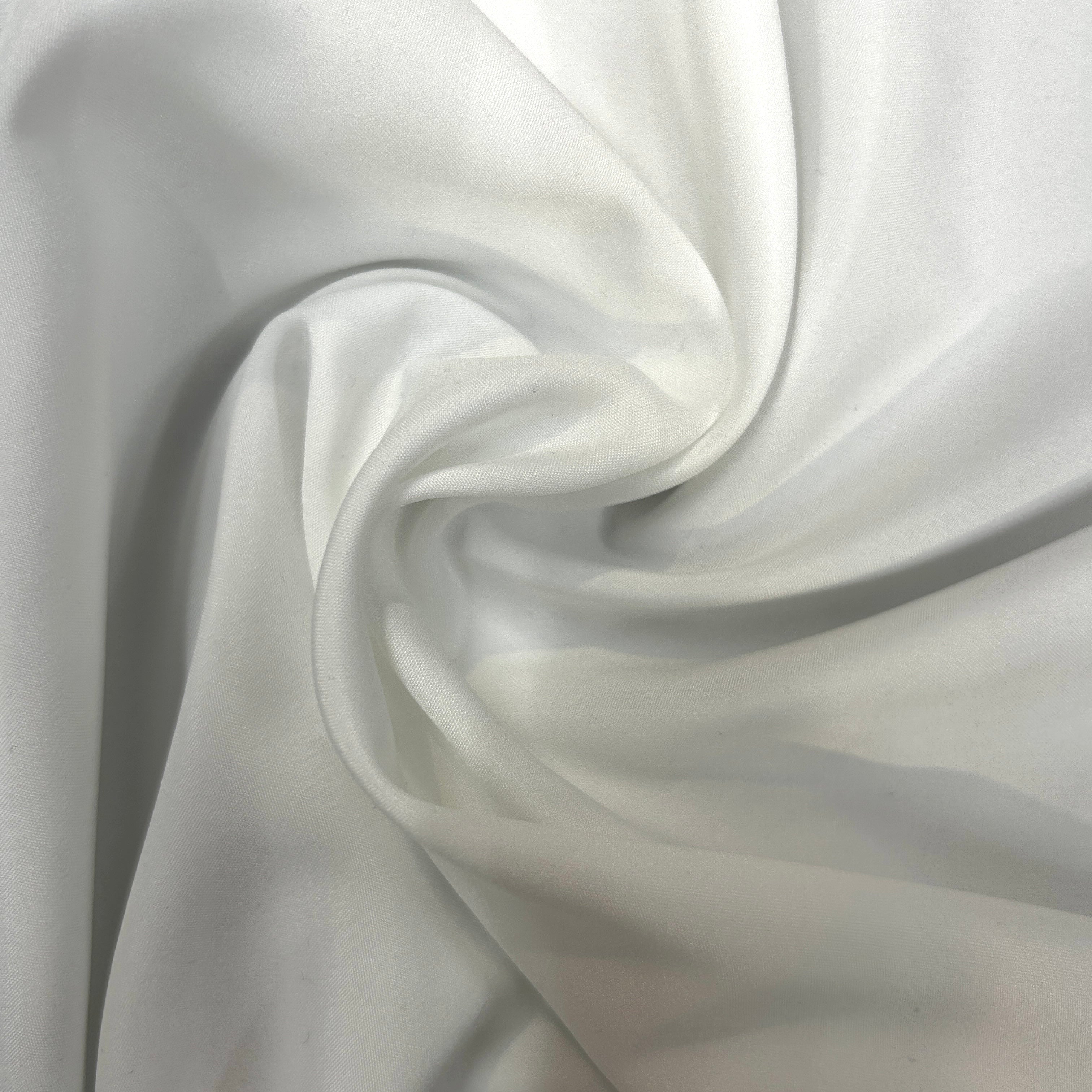 Close-up of white fabric with folds