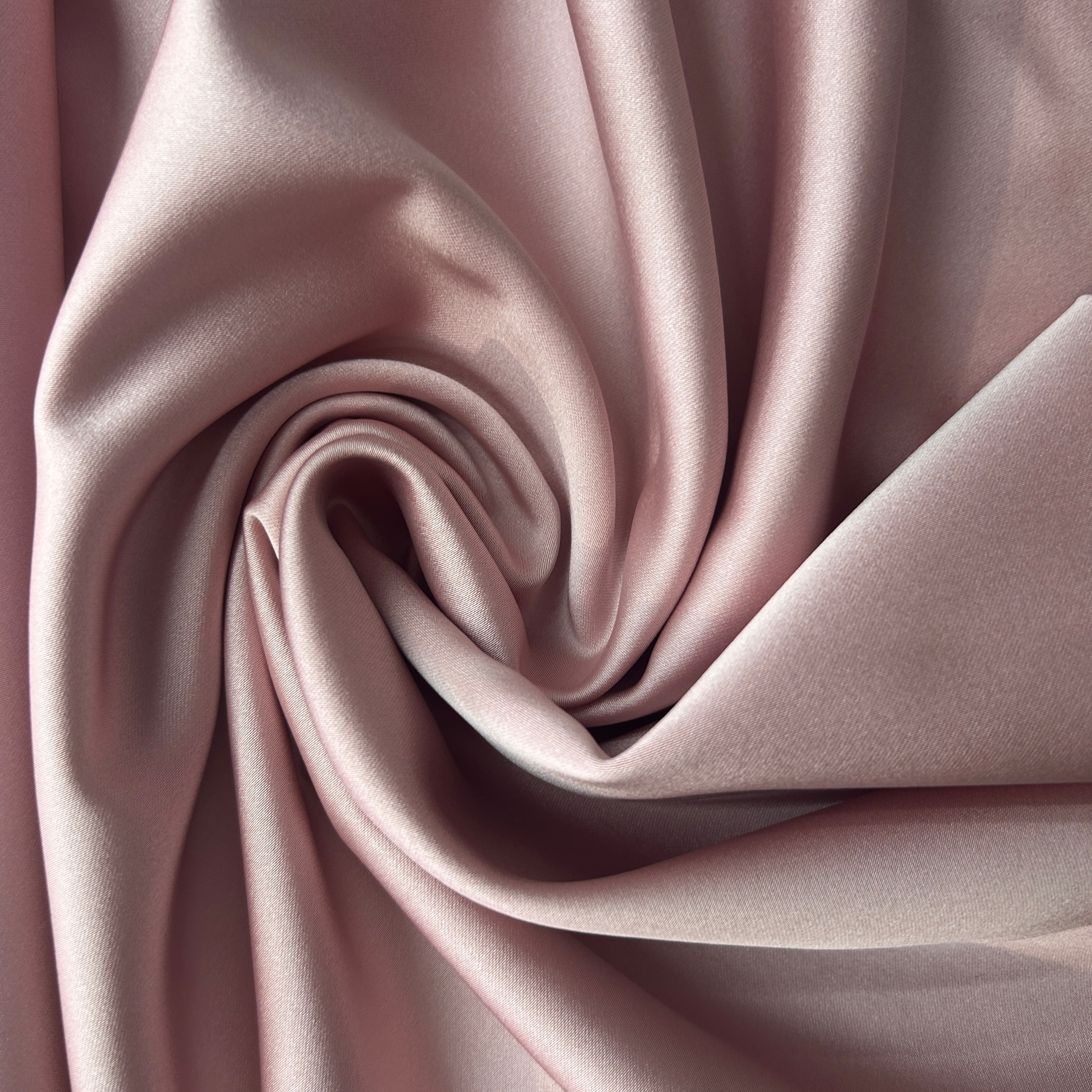 Close-up of pink fabric with folds