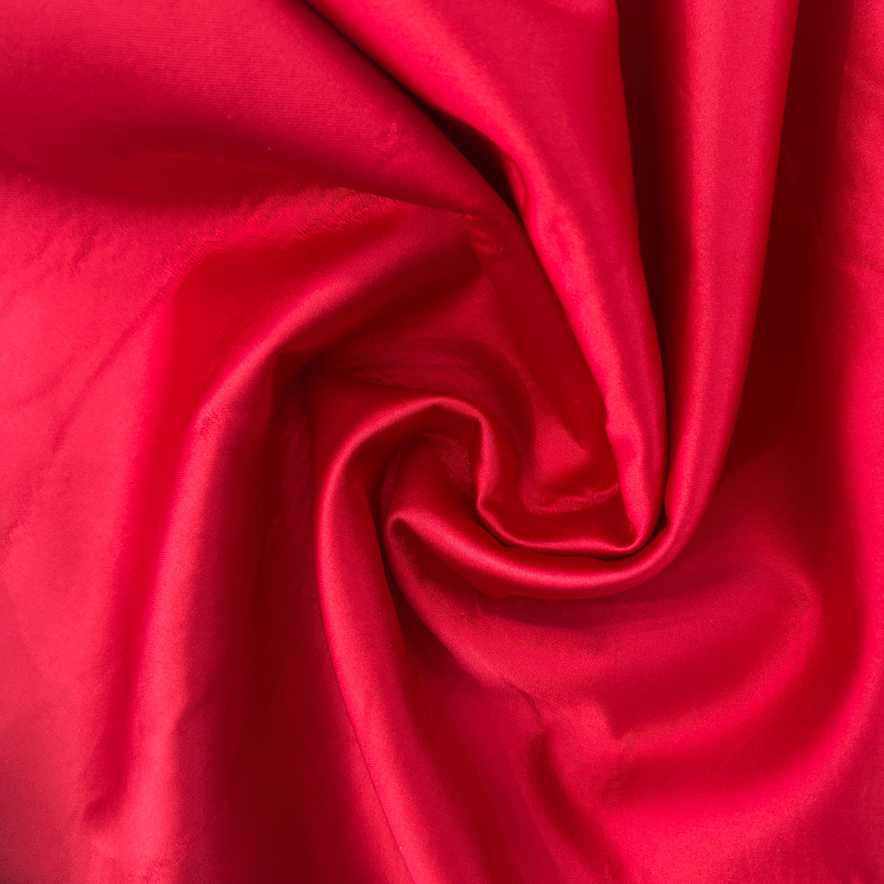 Close-up of red fabric with folds