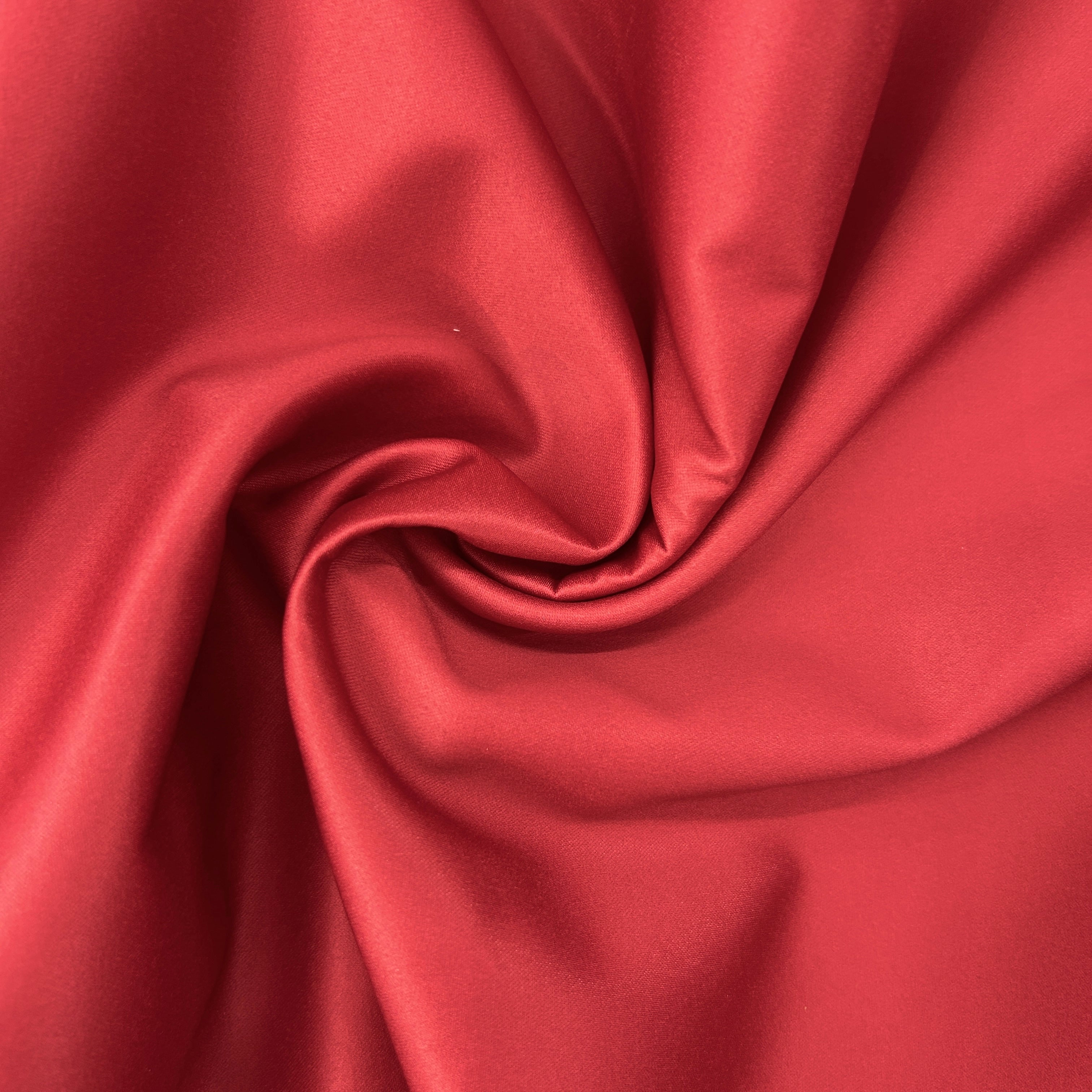 Close-up of red fabric with folds
