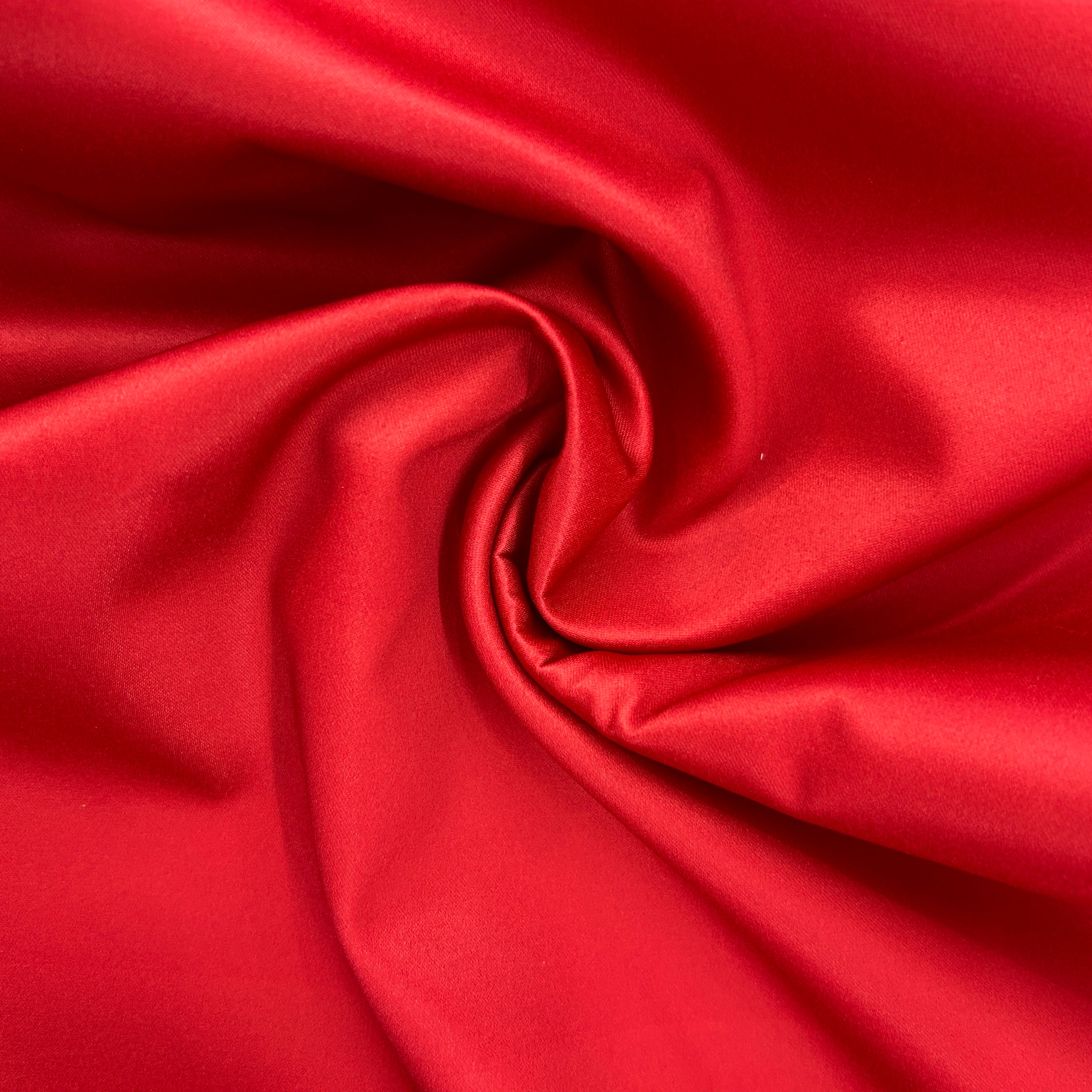 Close-up of red fabric with folds