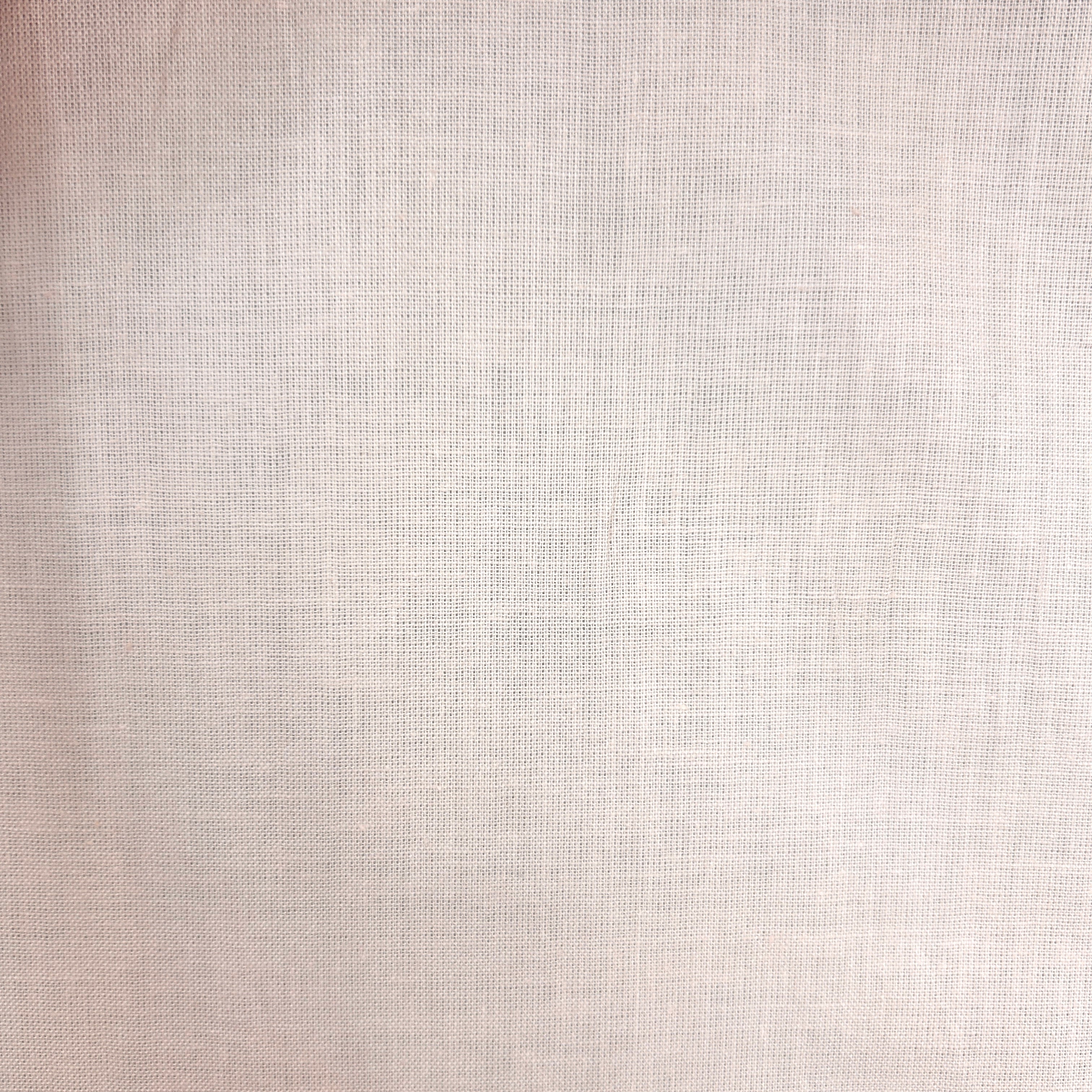 A close-up of a light beige woven fabric texture with a fine linen-like weave pattern.