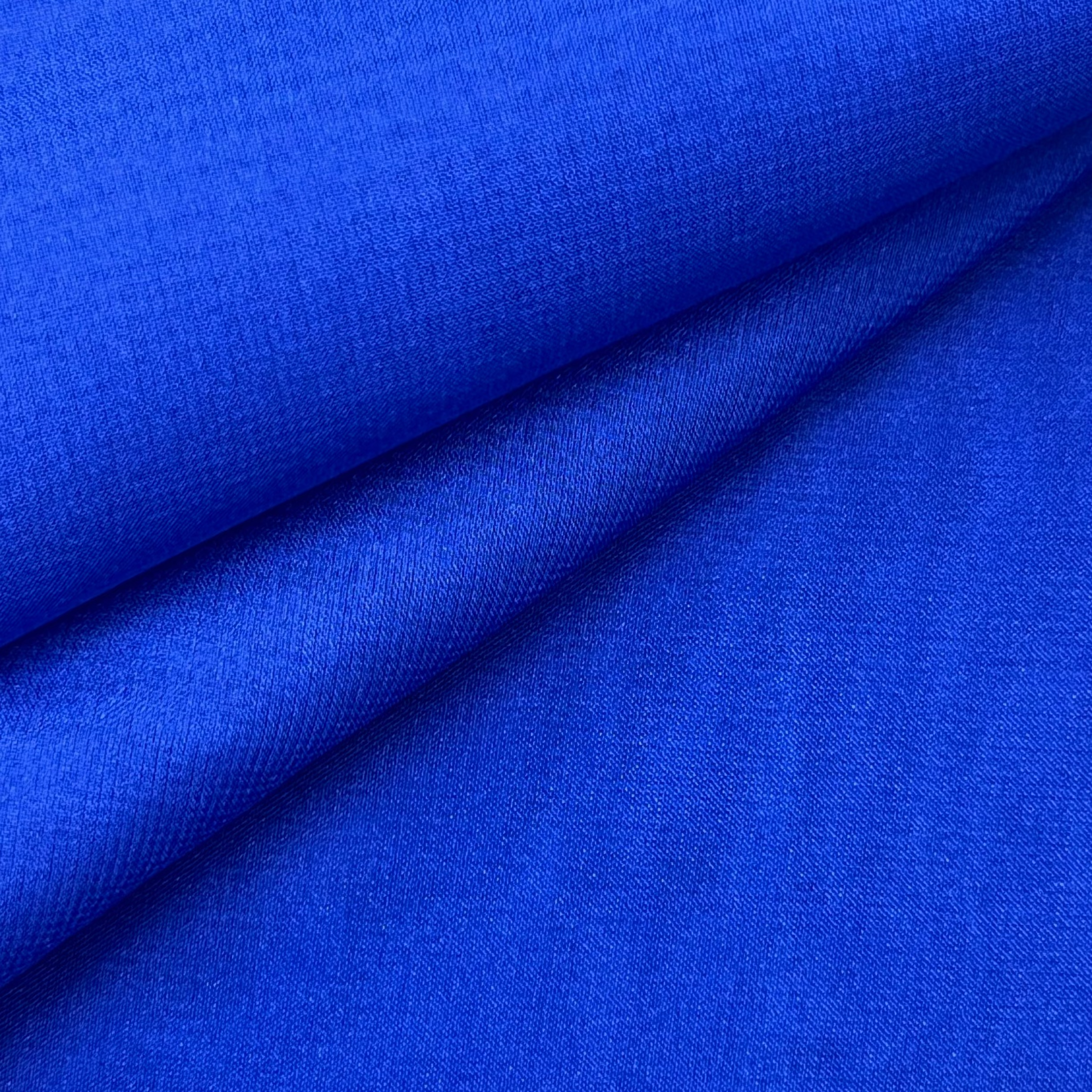A folded piece of vibrant blue ultra-thin polyester chiffon fabric with a soft matte finish.