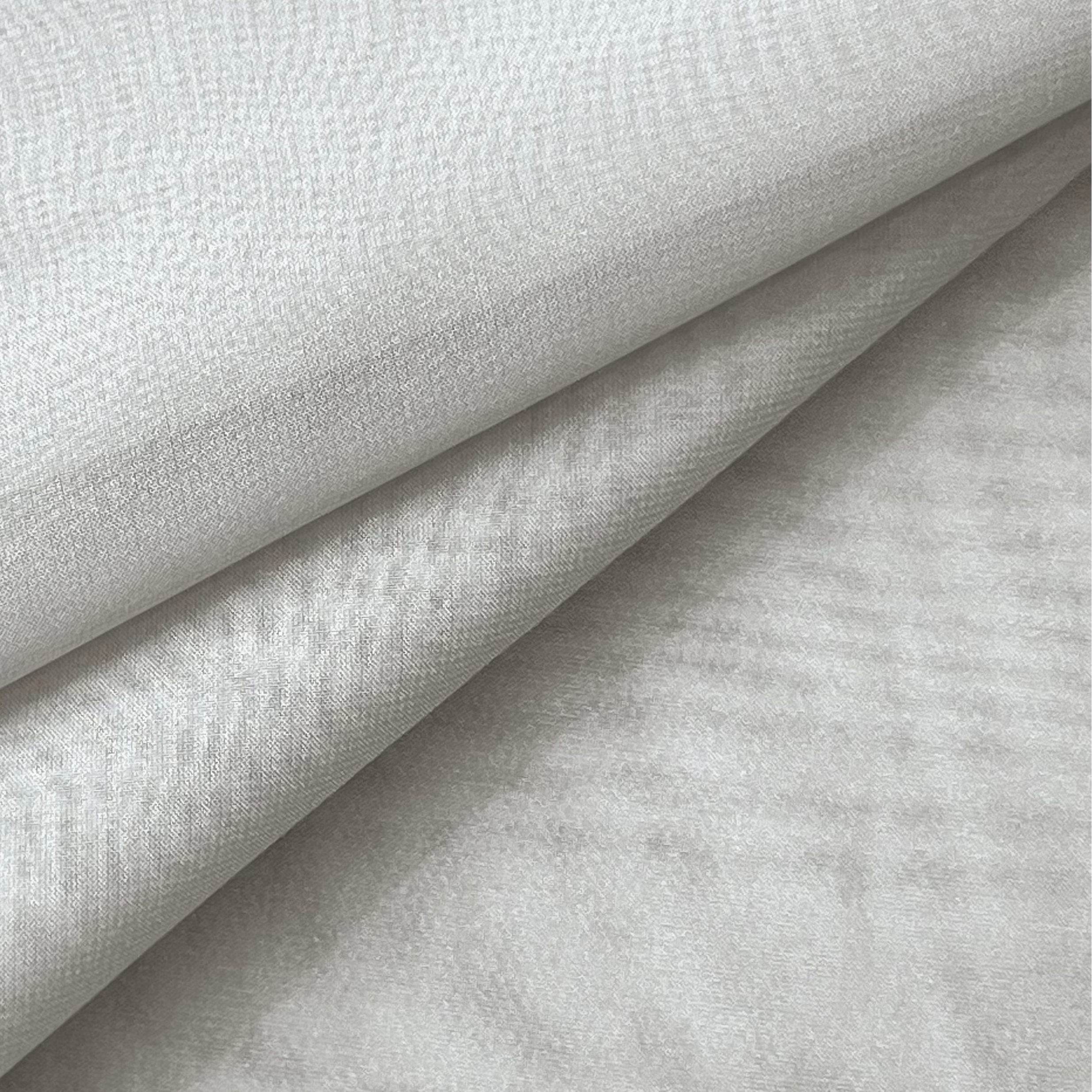 High quality ultra thin polyester chiffon fabric in a light grey color with a subtle textured weave.