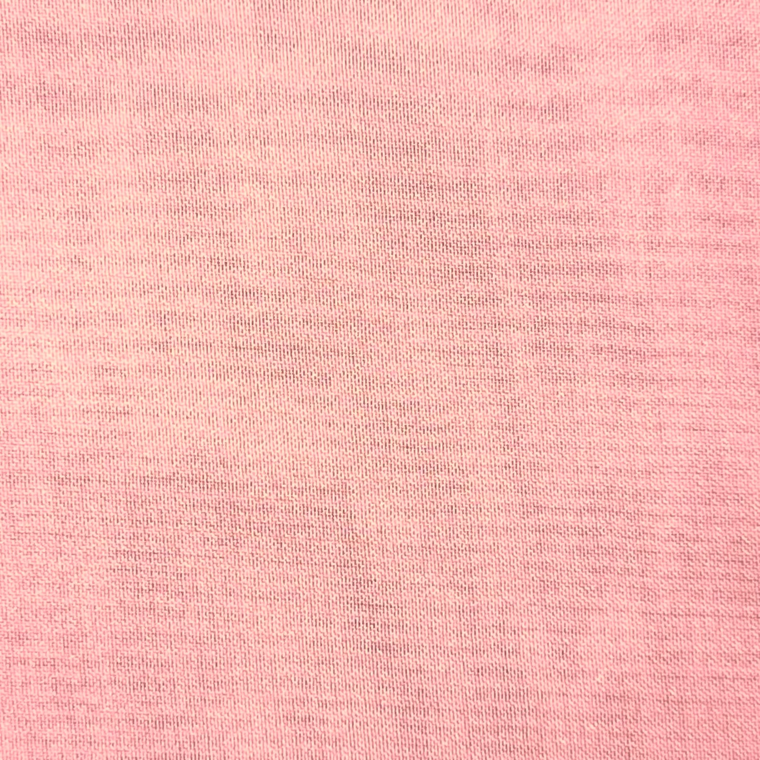 Close-up of high-quality ultra-thin pink polyester chiffon fabric with a fine moss-crepe texture.