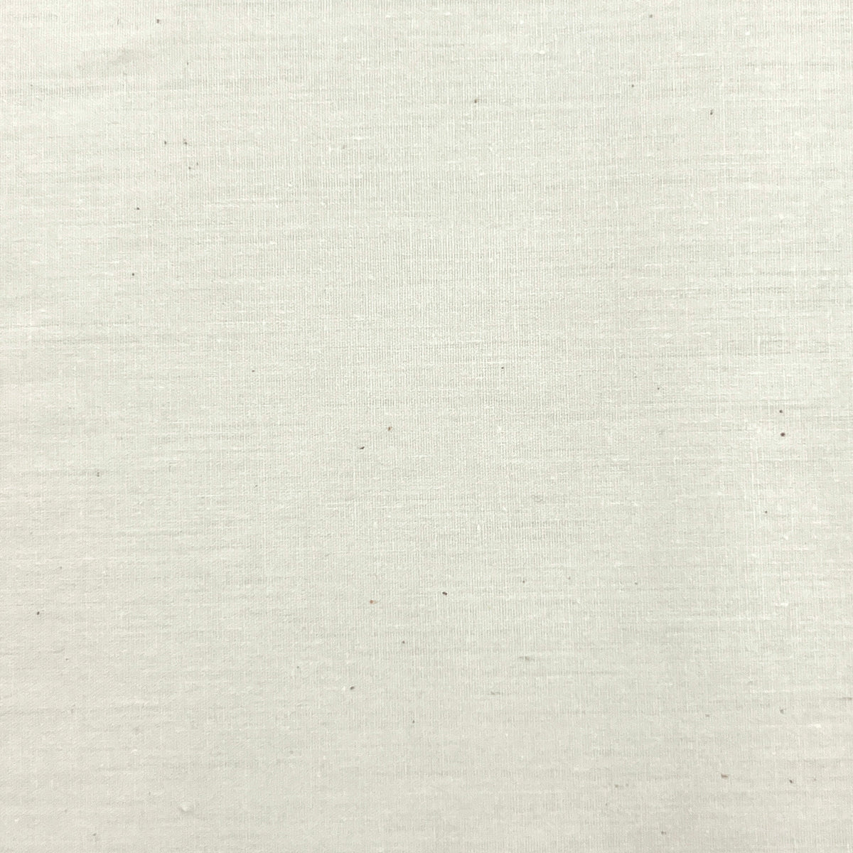 A close-up of a light beige fabric texture with a subtle woven pattern.
