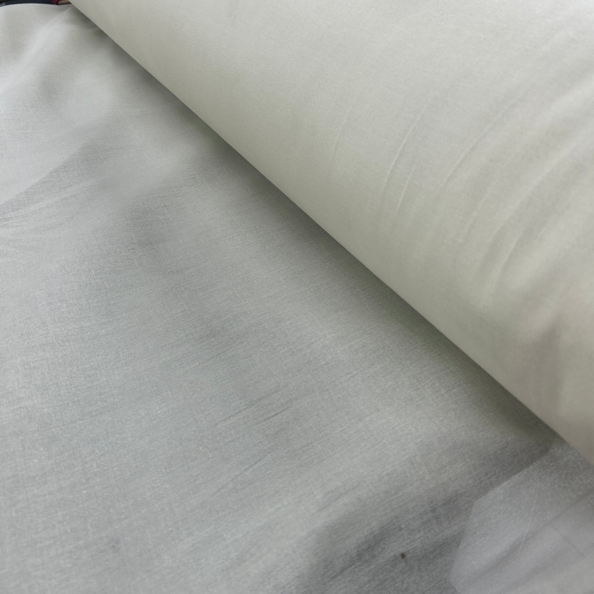 white fabric roll