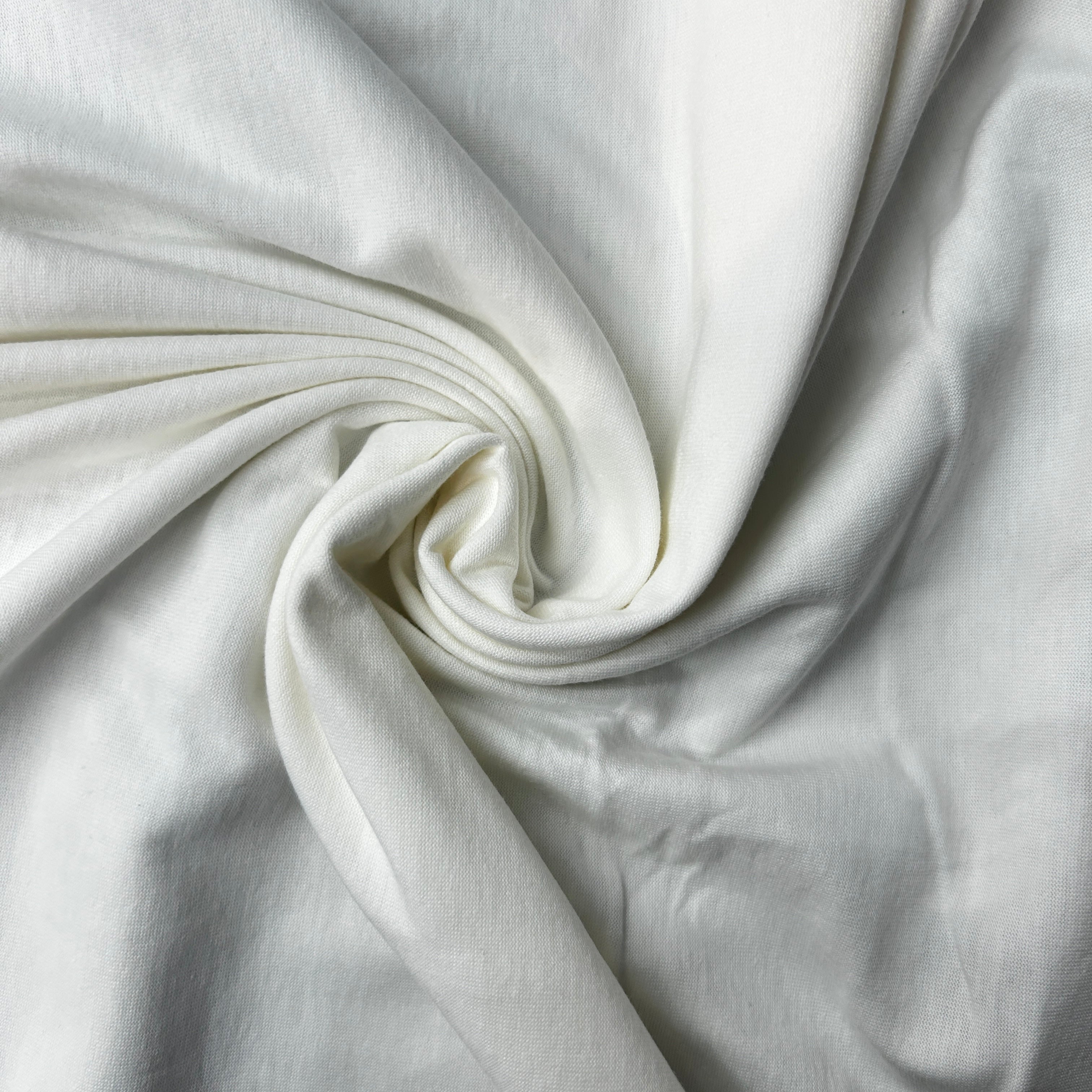 Close-up of white fabric with folds