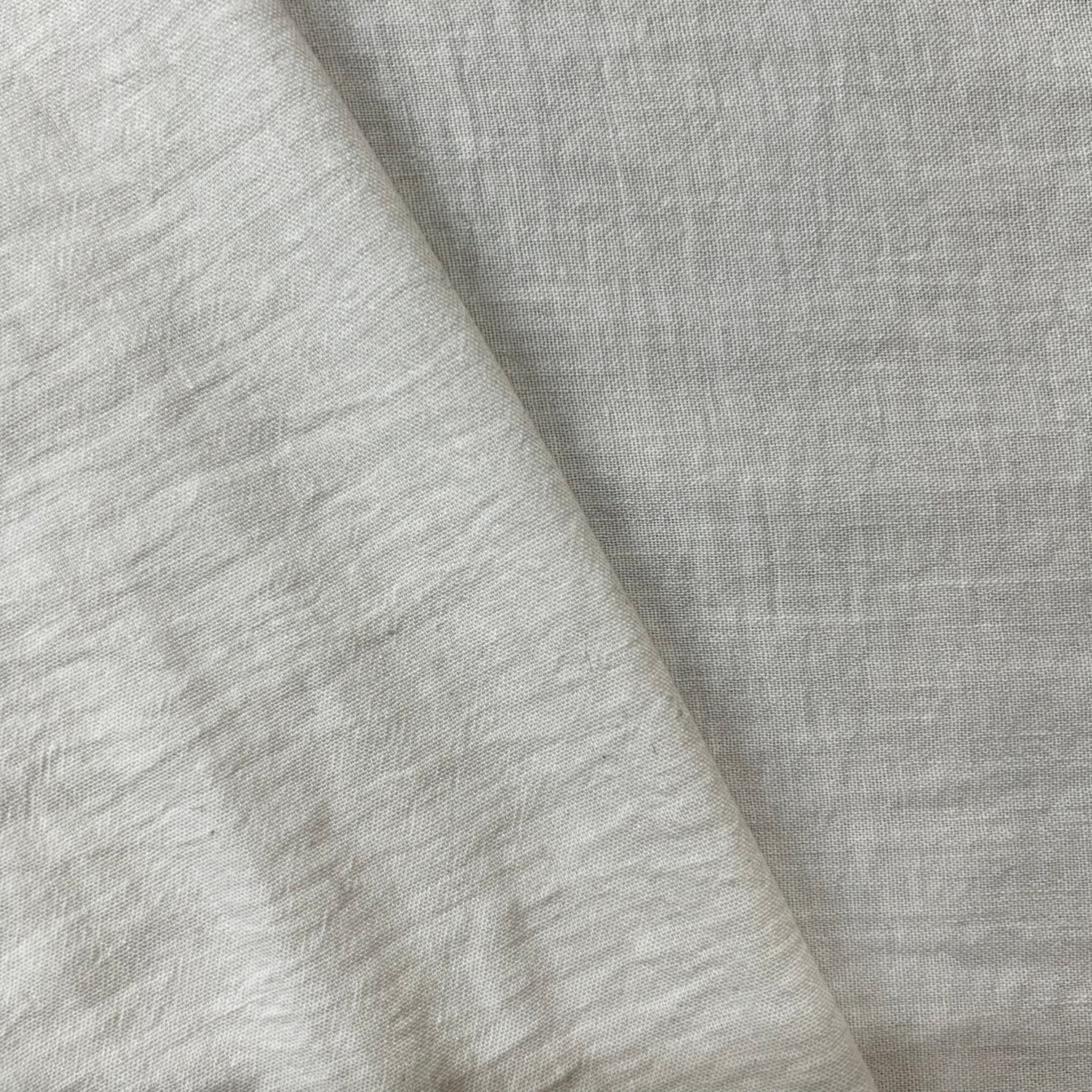 Close-up of gray fabric with a subtle texture
