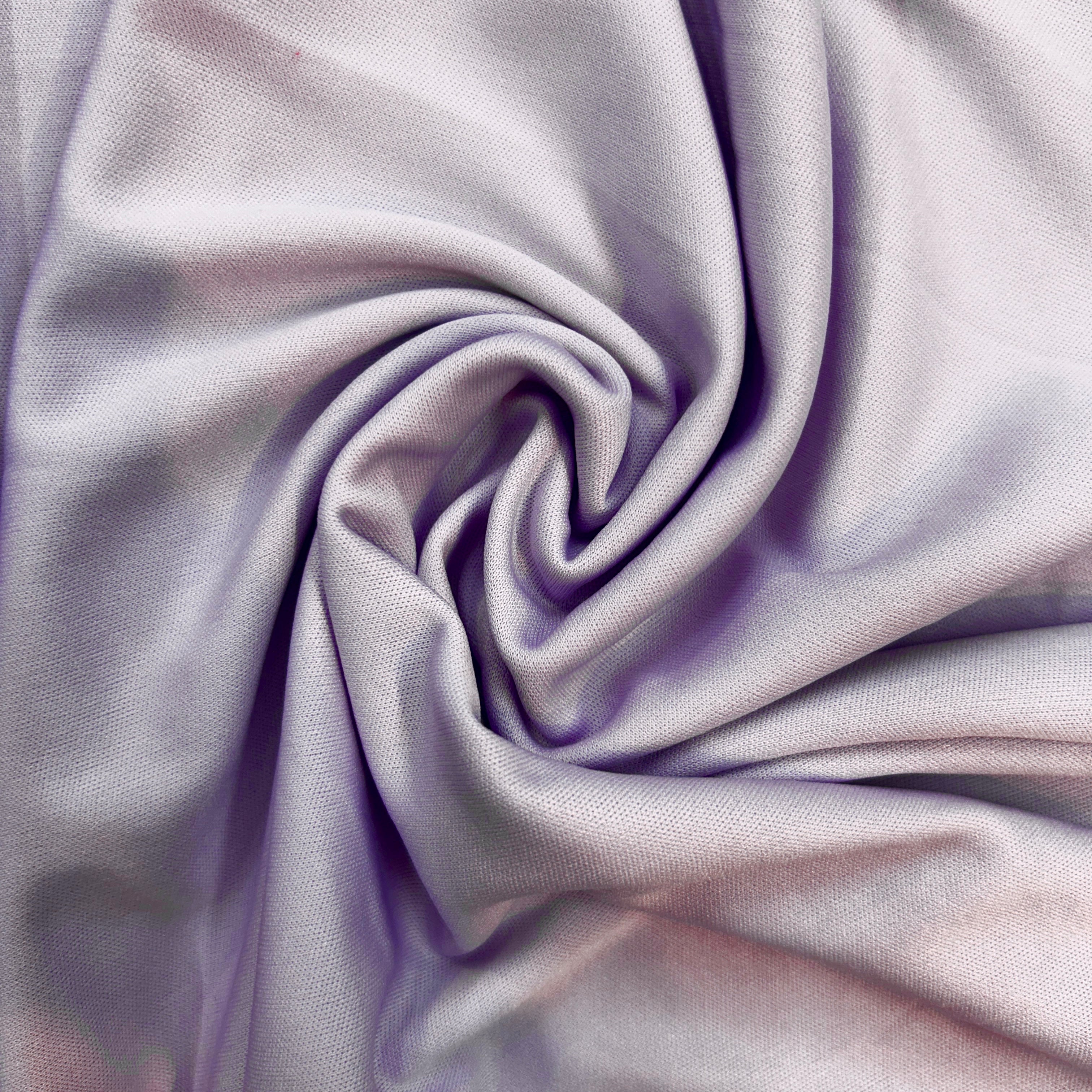 Close-up of purple fabric with folds