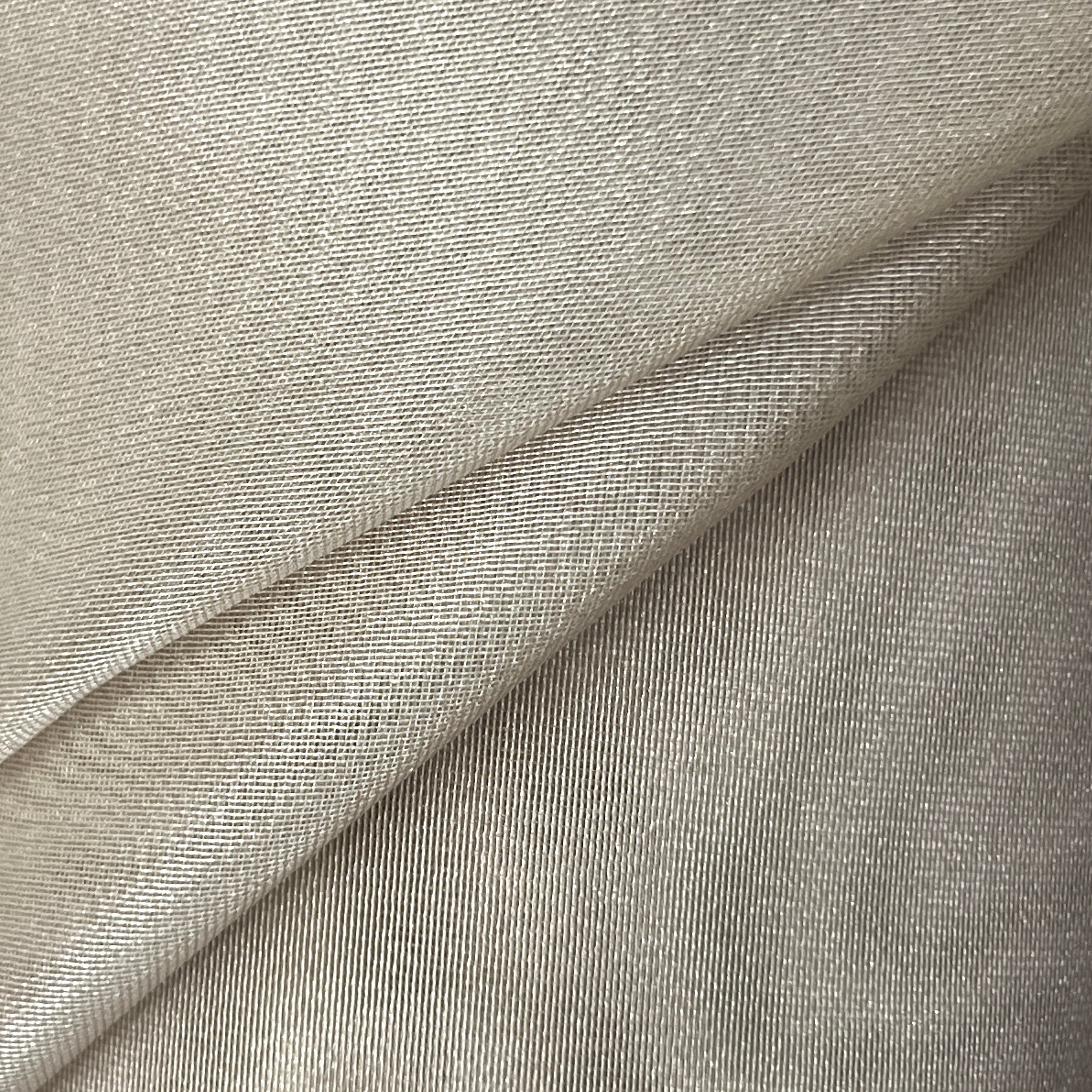 Close-up of gray fabric with a subtle texture