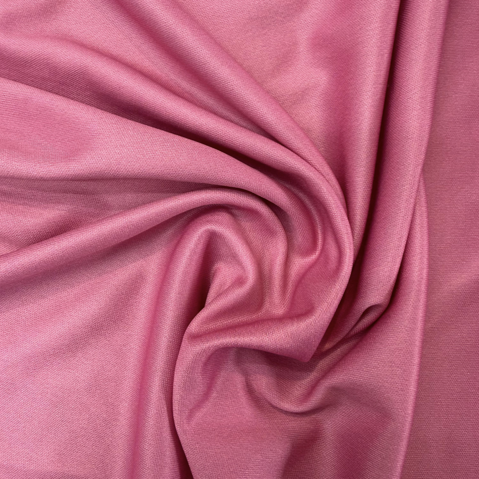 Close-up of pink fabric with folds