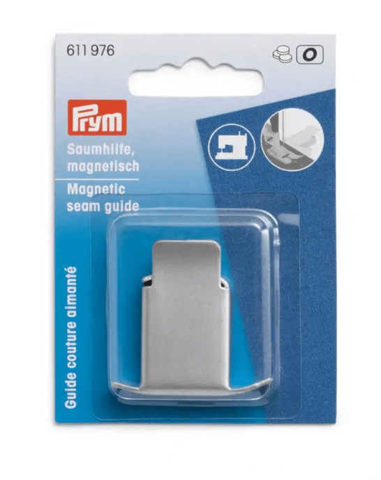 Silver-coloured magnetic seam guide for sewing machines.