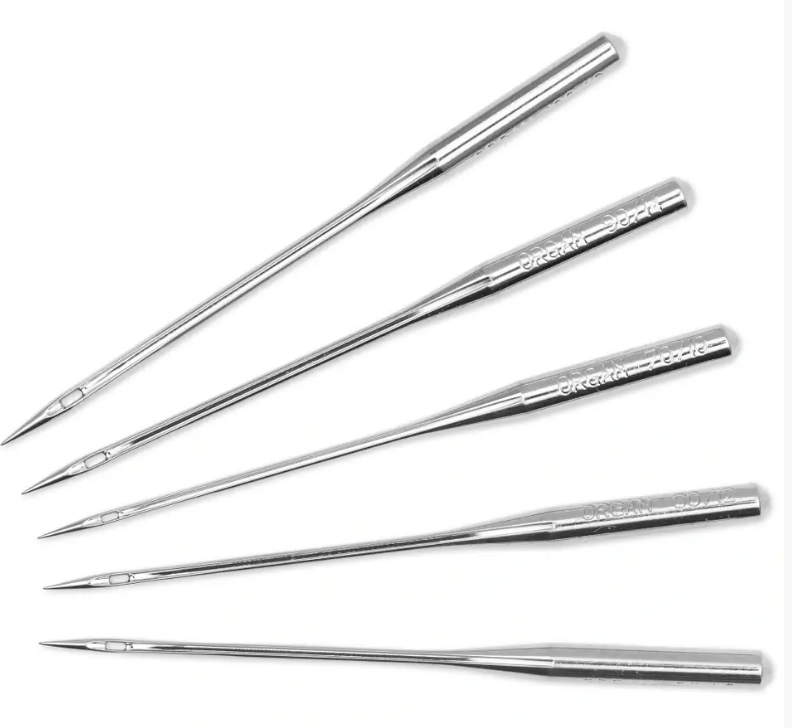 Five assorted steel sewing machine needles with flat shanks.