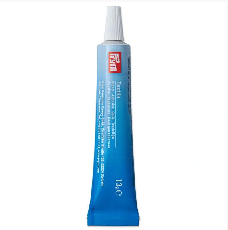 Textil+ transparent fabric glue in a 13g tube.