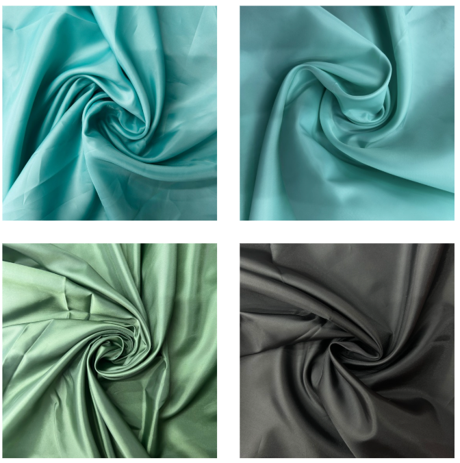 Four square fabric swatches arranged in a 2x2 grid, each showing the material draped in a swirl. The top-left swatch is a light aqua/mint tone, the top-right is a pale minty blue-green, the bottom-left is a soft sage green, and the bottom-right is a dark charcoal gray.
