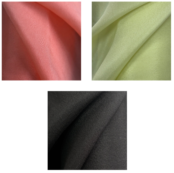 Draped stretch silk chiffon fabric samples in coral, lime, and black colors.