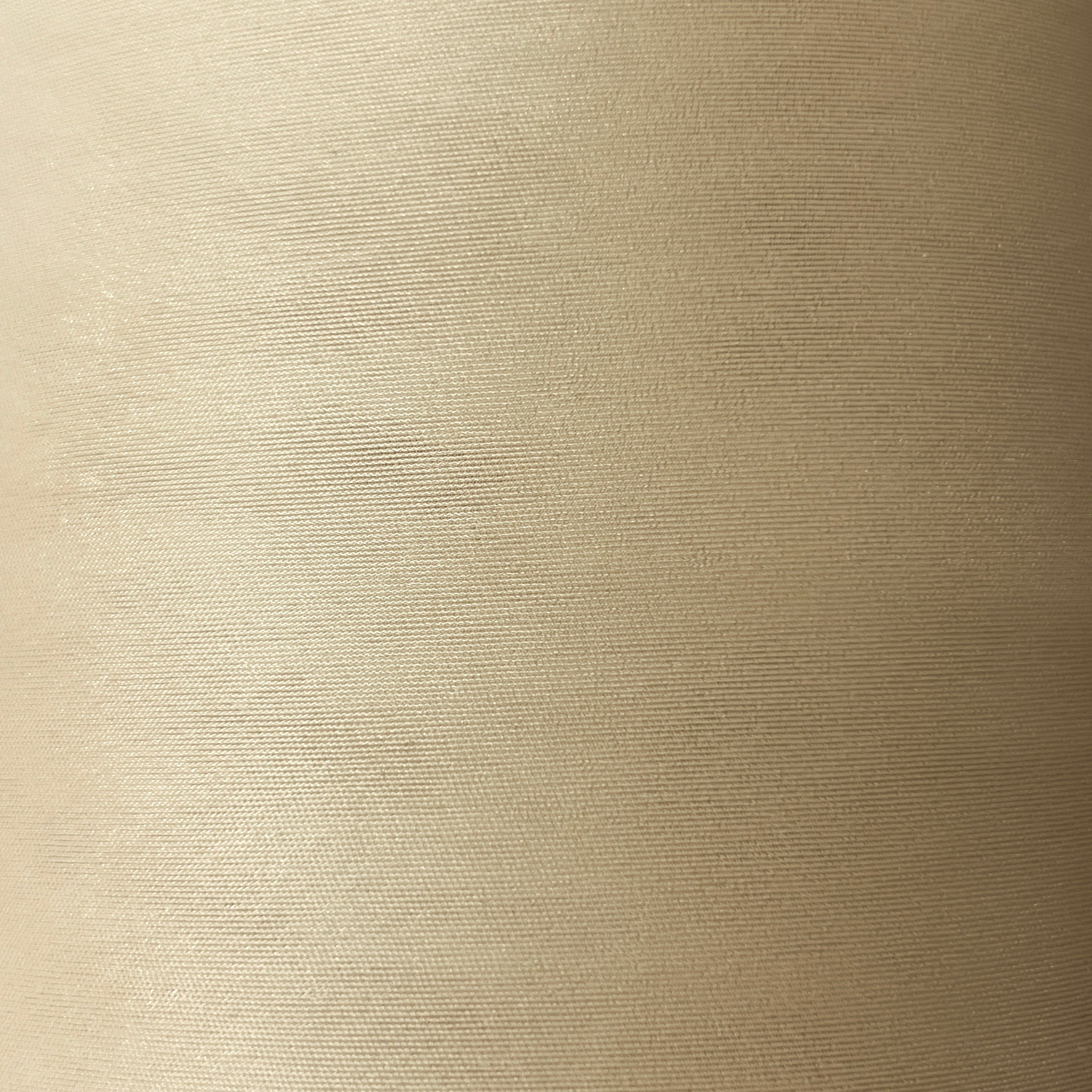 Beige textured fabric surface