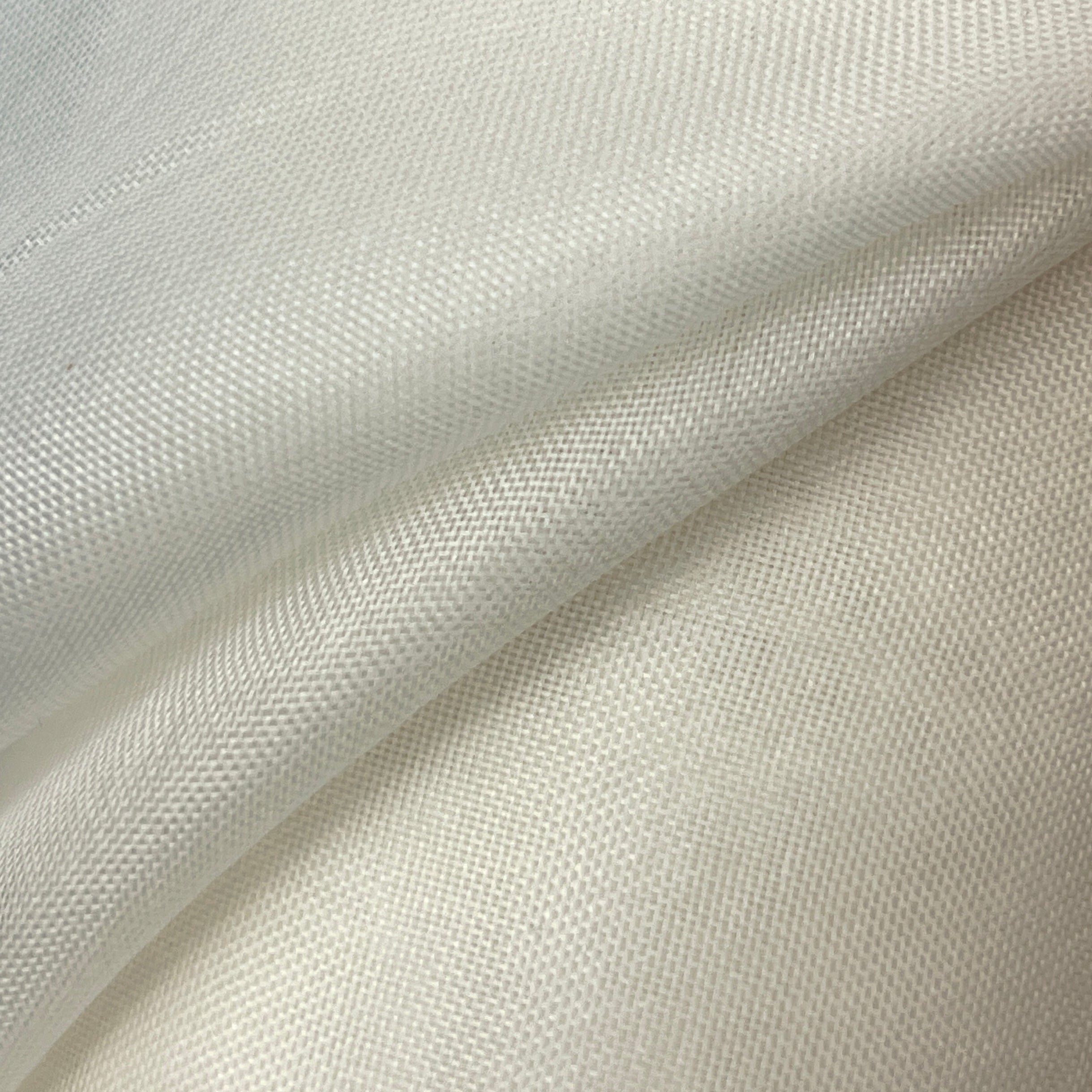 Close-up of beige fabric with a subtle texture