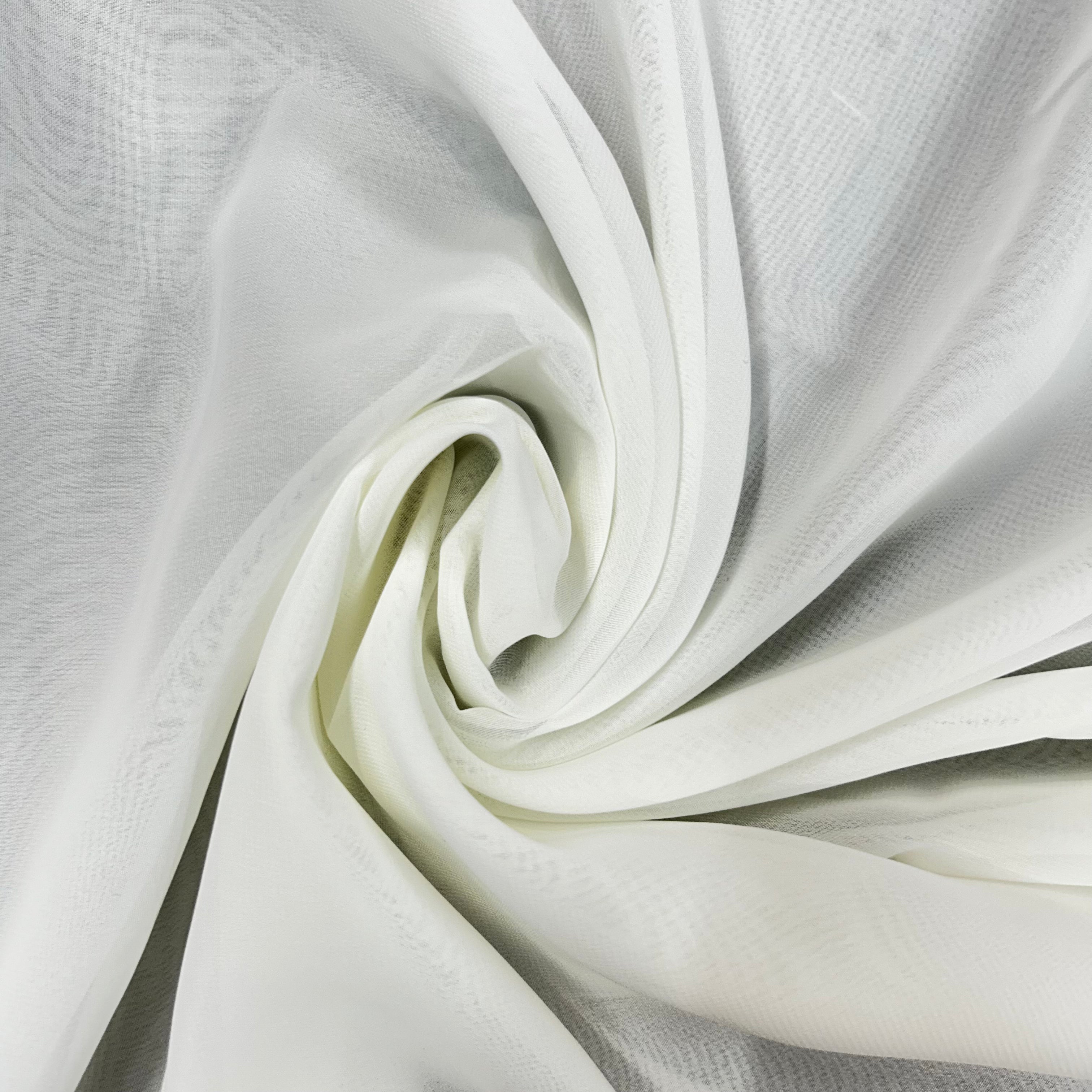 Close-up of white fabric with a subtle texture