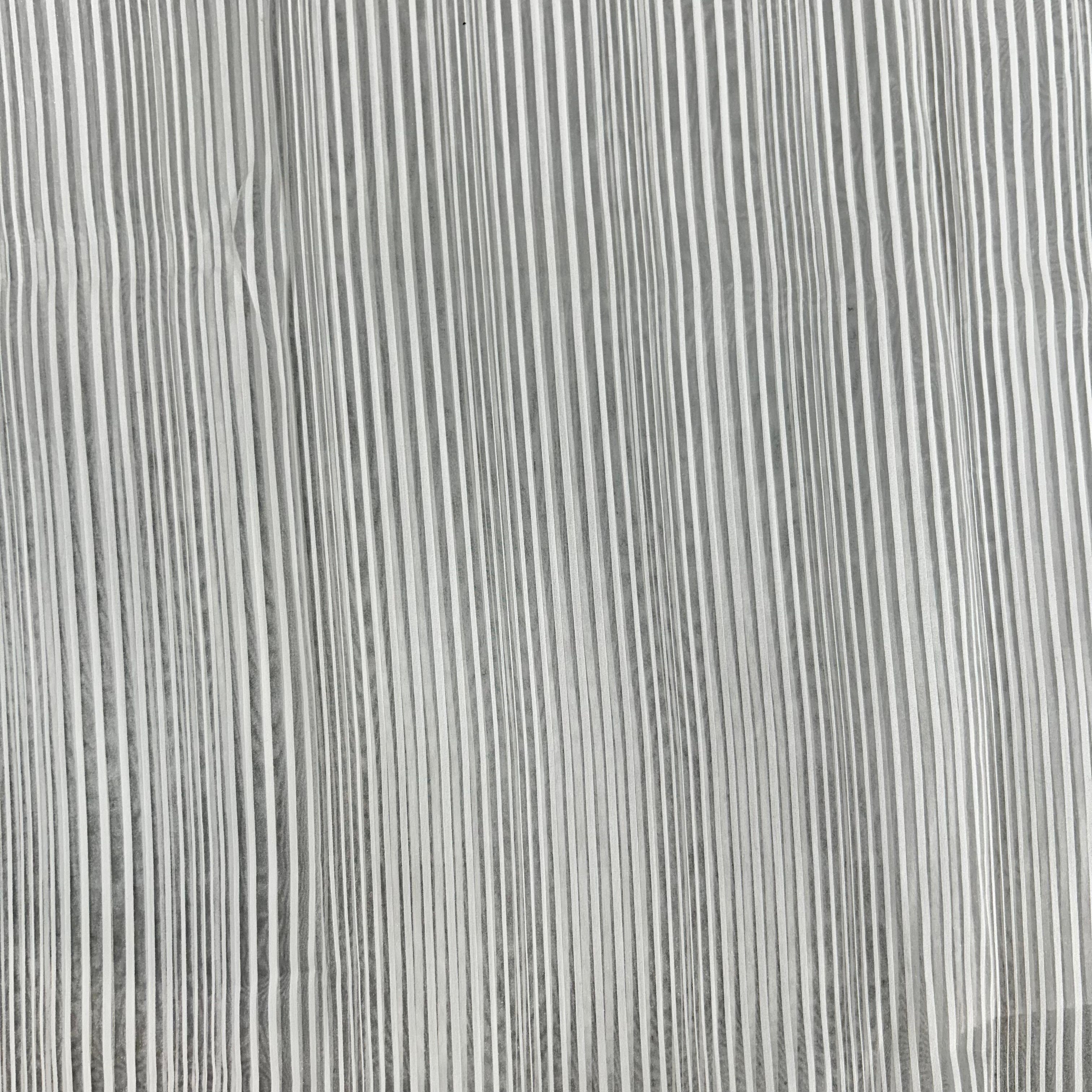 Close-up of a textured surface with vertical lines