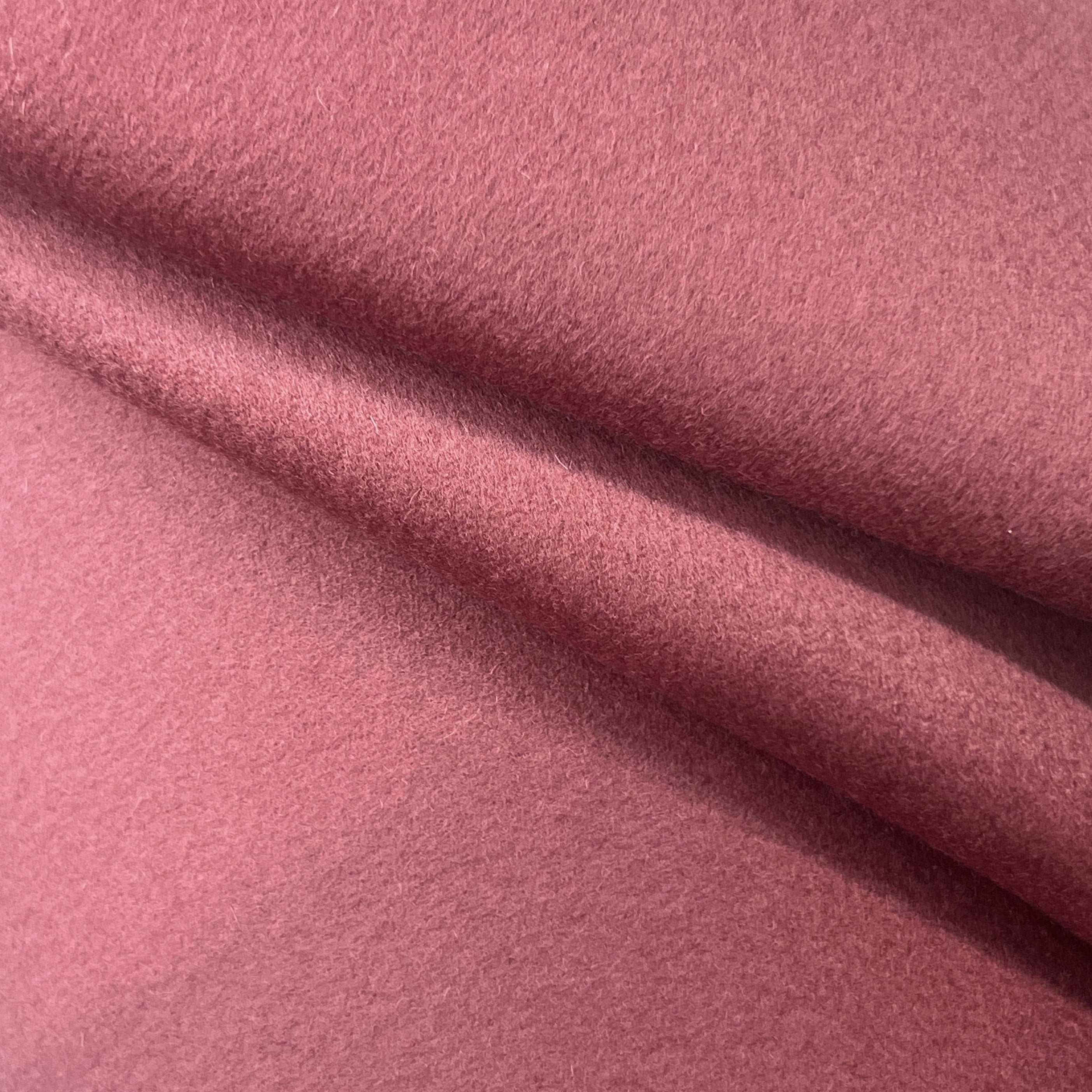 Close-up of pink fabric with a soft texture