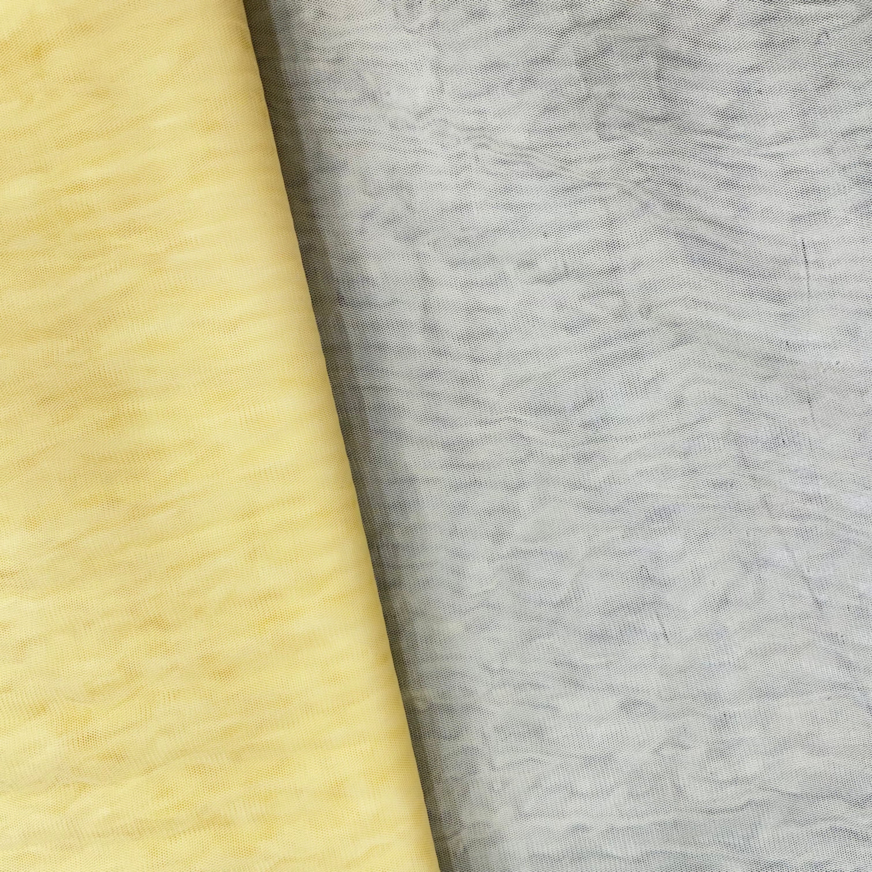 Close-up of beige and gray textured fabric swatches.