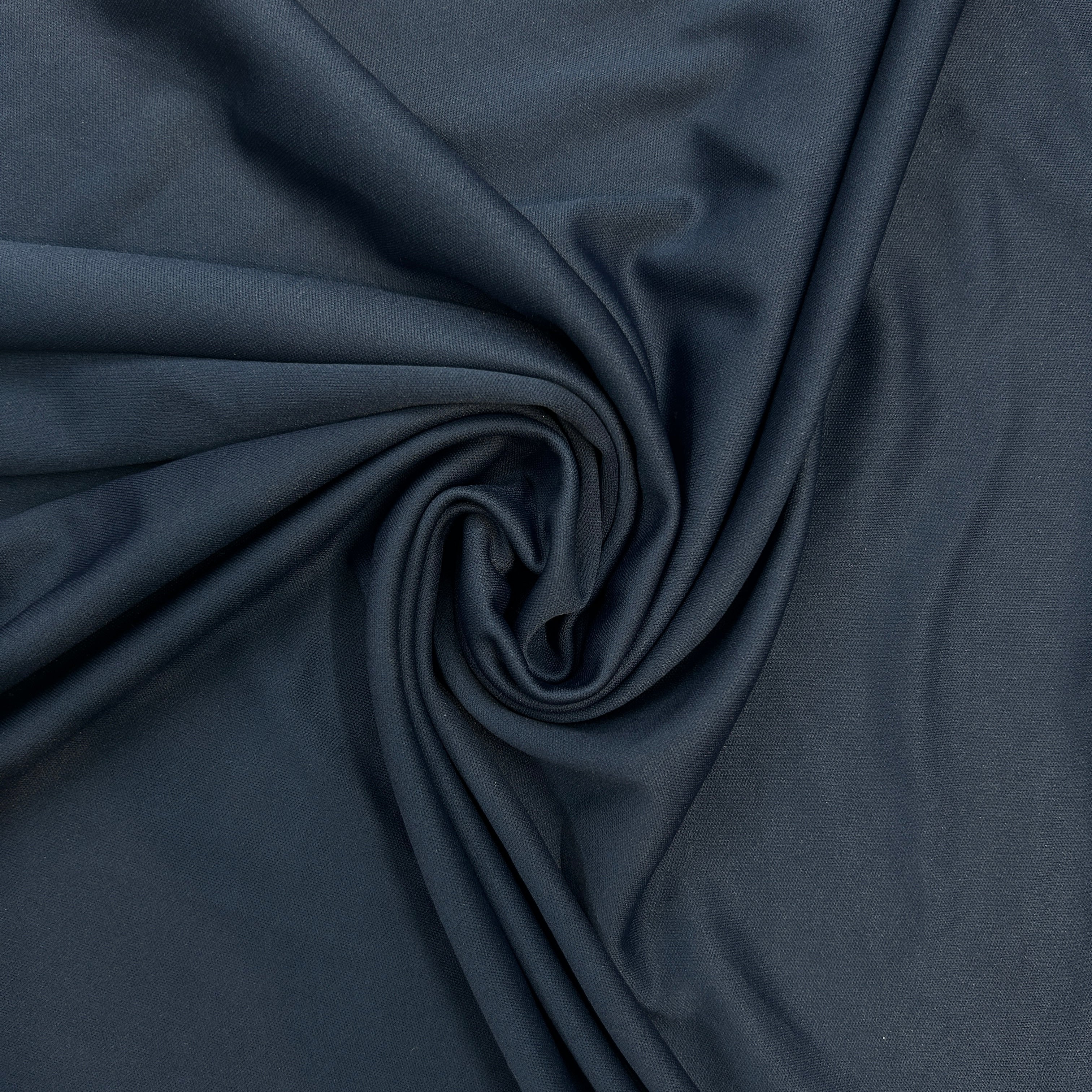 Navy blue fabric with folds