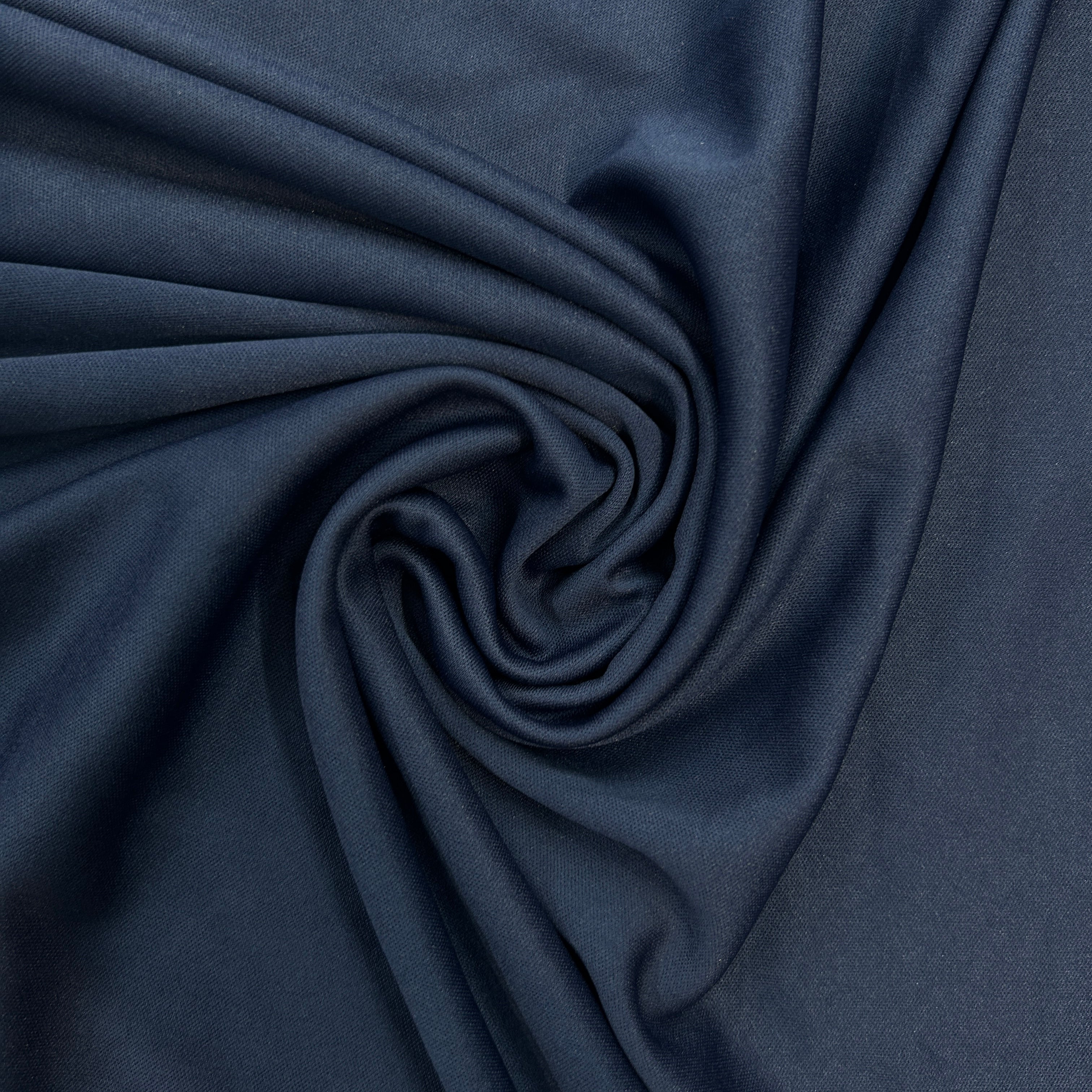 Navy blue fabric with folds